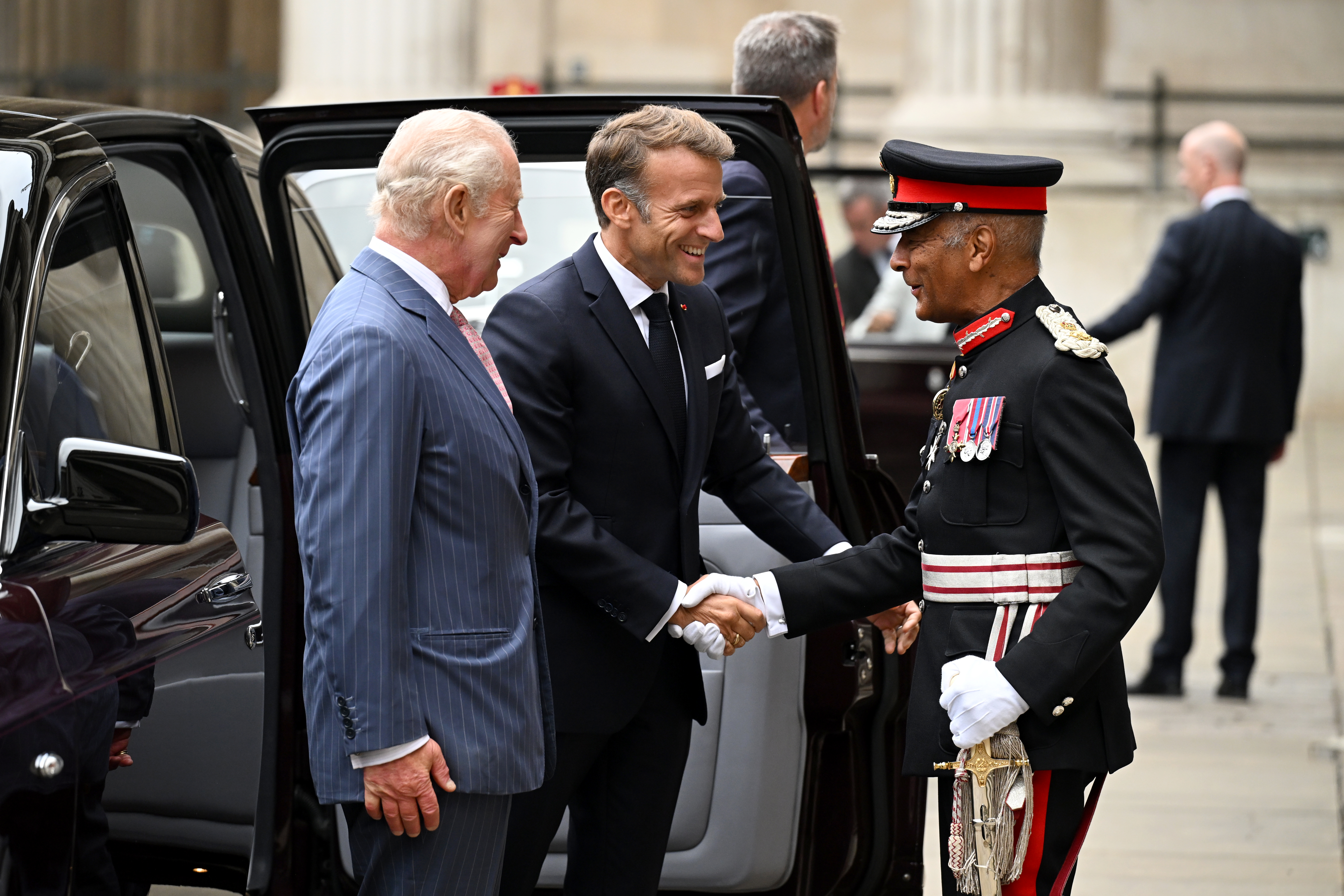 LONDON, ENGLAND - SEPTEMBER 2: Britain's King Charles III (L) and France's President Emmanuel Macron (C) arrive to attend a viewing of the Bayeux Tapestry Exhibition at British Museum on September 2, 2026 in London, England. The tapestry, which depicts events leading up to the Norman Conquest of England in 1066, has been loaned by France to the UK for the first time since it was made nearly 1,000 years ago, following a historic agreement between the United Kingdom and France. (Photo by Leon Neal/Getty Images)