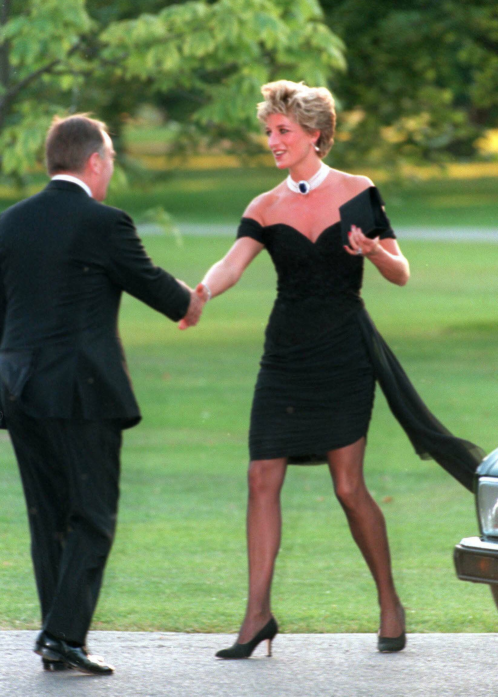 LONDON - NOVEMBER 20:  Diana, Princess of Wales, wearing a stunning black dress commissioned from Christina Stambolian, attends the Vanity Fair party at the Serpentine Gallery on November 20, 1994 in London, England.  The famous black