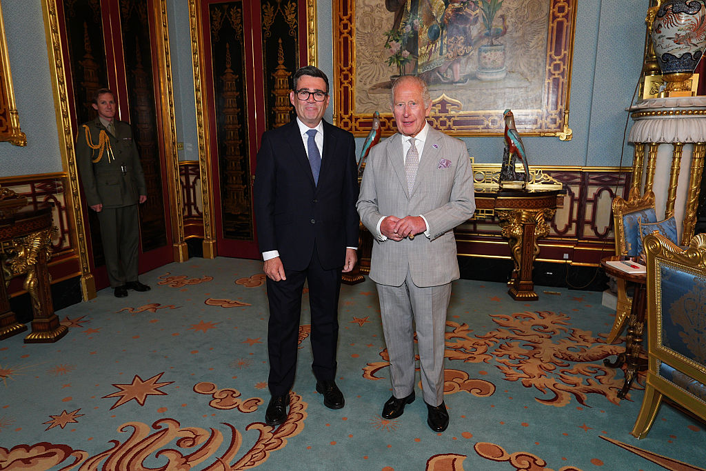 LONDON, ENGLAND - JULY 20: King Charles III (R) welcomes Andy Burnham, during an audience at Buckingham Palace where he invited the leader of the Labour Party to become Prime Minister and form a new government on July 20, 2026 in London, England. The Member of Parliament for Makerfield becomes the UK's 59th Prime Minister, succeeding Sir Keir Starmer, who resigned as leader of the Labour Party and Prime Minister in June. (Photo by Aaron Chown - Pool/Getty Images)