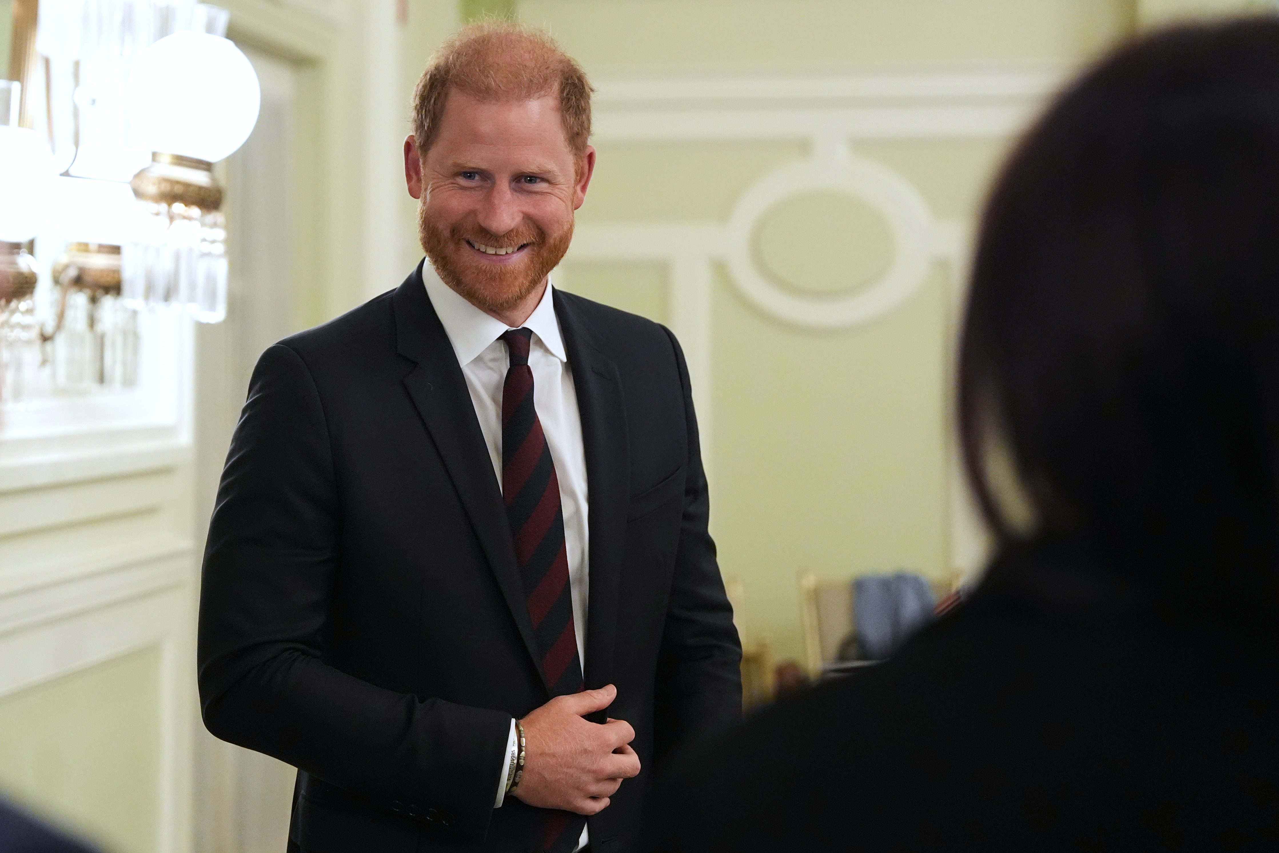 Britain's Prince Harry, the Duke of Sussex, arrives to speak at a roundtable about support for veterans on Wednesday, Aug. 19, 2026, in Washington. (Image Source: AP Photo |
 Alex Brandon)