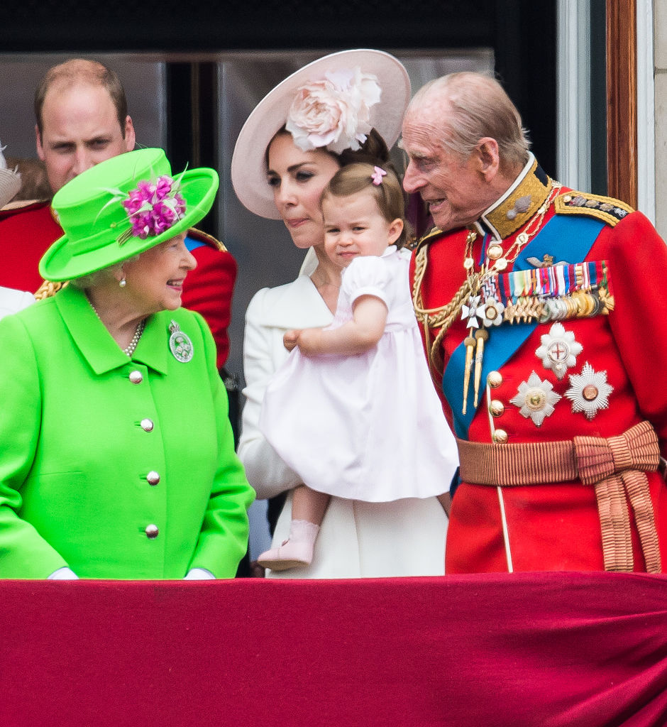 Queen Elizabeth, Prince Philip, Princess Charlotte, and Princess Kate on the Buckingham Palace balcony during Trooping the Colour. (Image Source: Getty Images| Samir Hussein/WireImage)