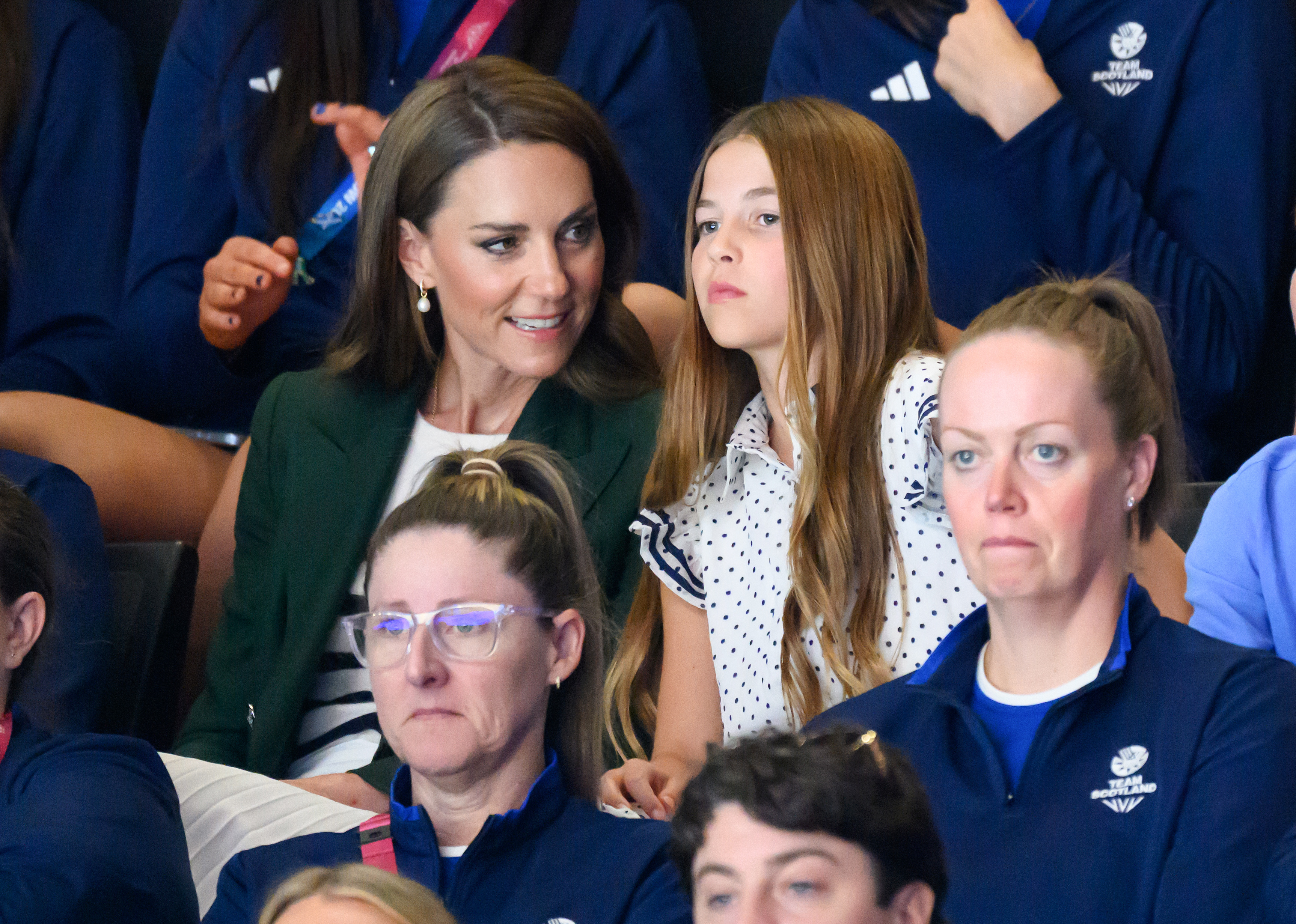 Catherine, Princess of Wales, and Princess Charlotte of Wales watch the netball semi-final match between Team Australia and Team Jamaica.  (Image Source: Getty Images | Karwai Tang/WireImage)