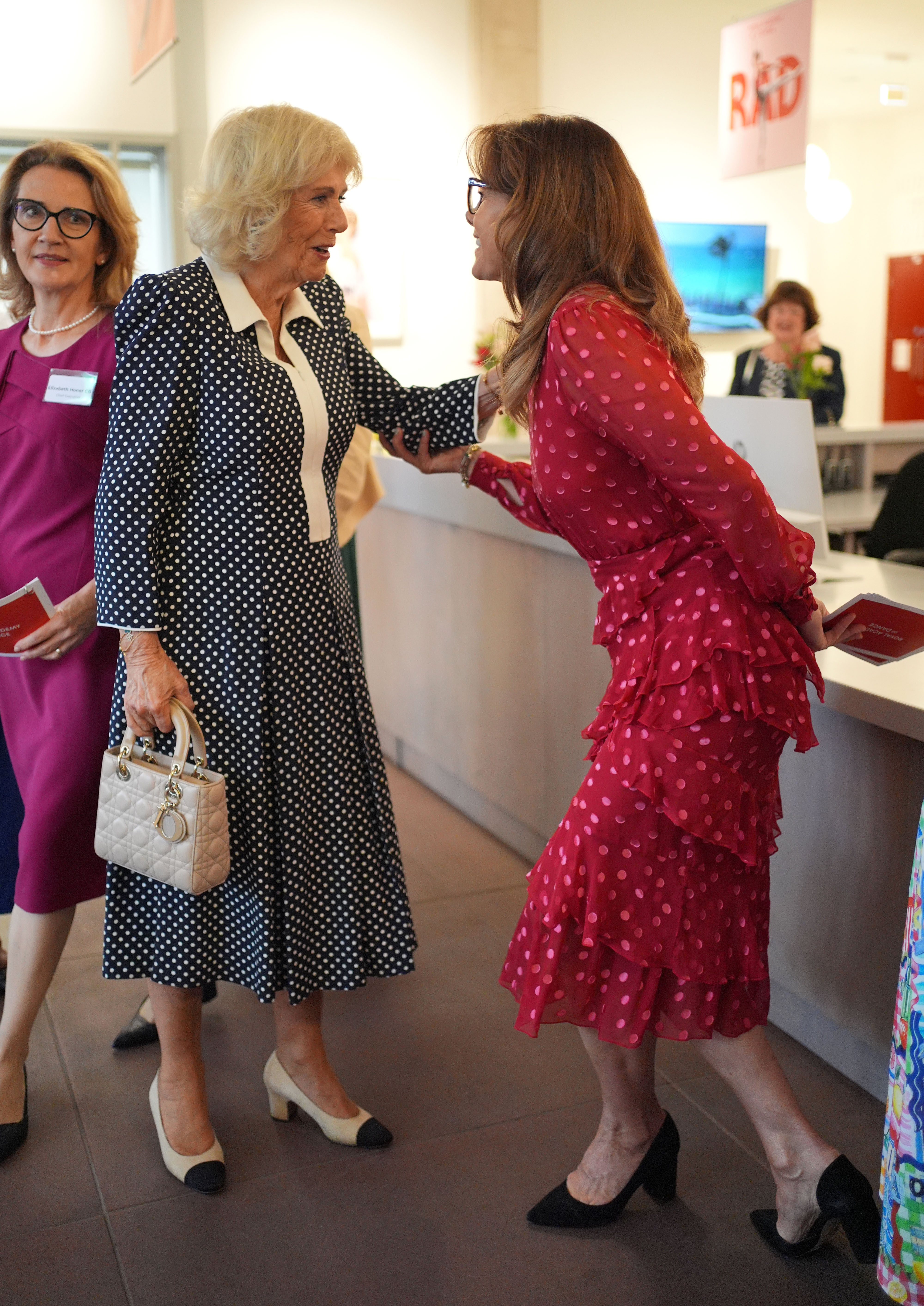 LONDON, ENGLAND - SEPTEMBER 02: Queen Camilla, Patron of the Royal Academy of Dance (RAD) (centre) with president Dame Darcey Bussell during a visit to their global headquarters on September 2, 2026 in London, England. Queen Camilla witnessed a broad range of programmes the academy offers as part of its charitable work, including programmes supporting older dancers, people affected by cancer, and young people participating in a street dance lesson. (Photo by Yui Mok - WPA Pool/Getty Images)