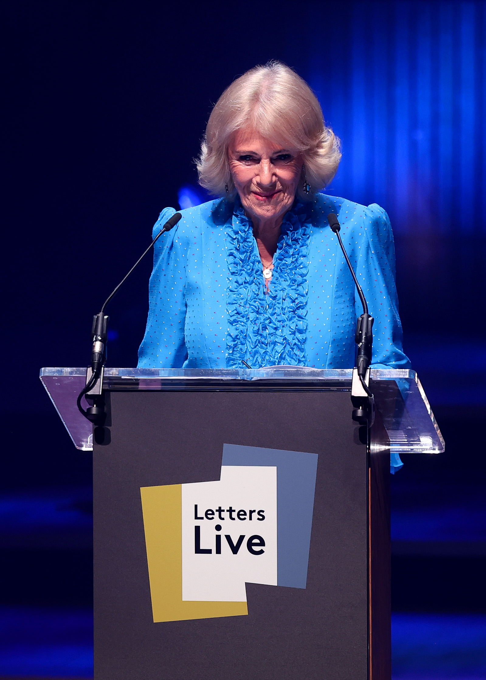 LONDON, ENGLAND - SEPTEMBER 03: Queen Camilla reads onstage during Letters Live 2026 at The Royal Festival Hall on September 03, 2026 in London, England. (Photo by Chris Jackson/Getty Images)