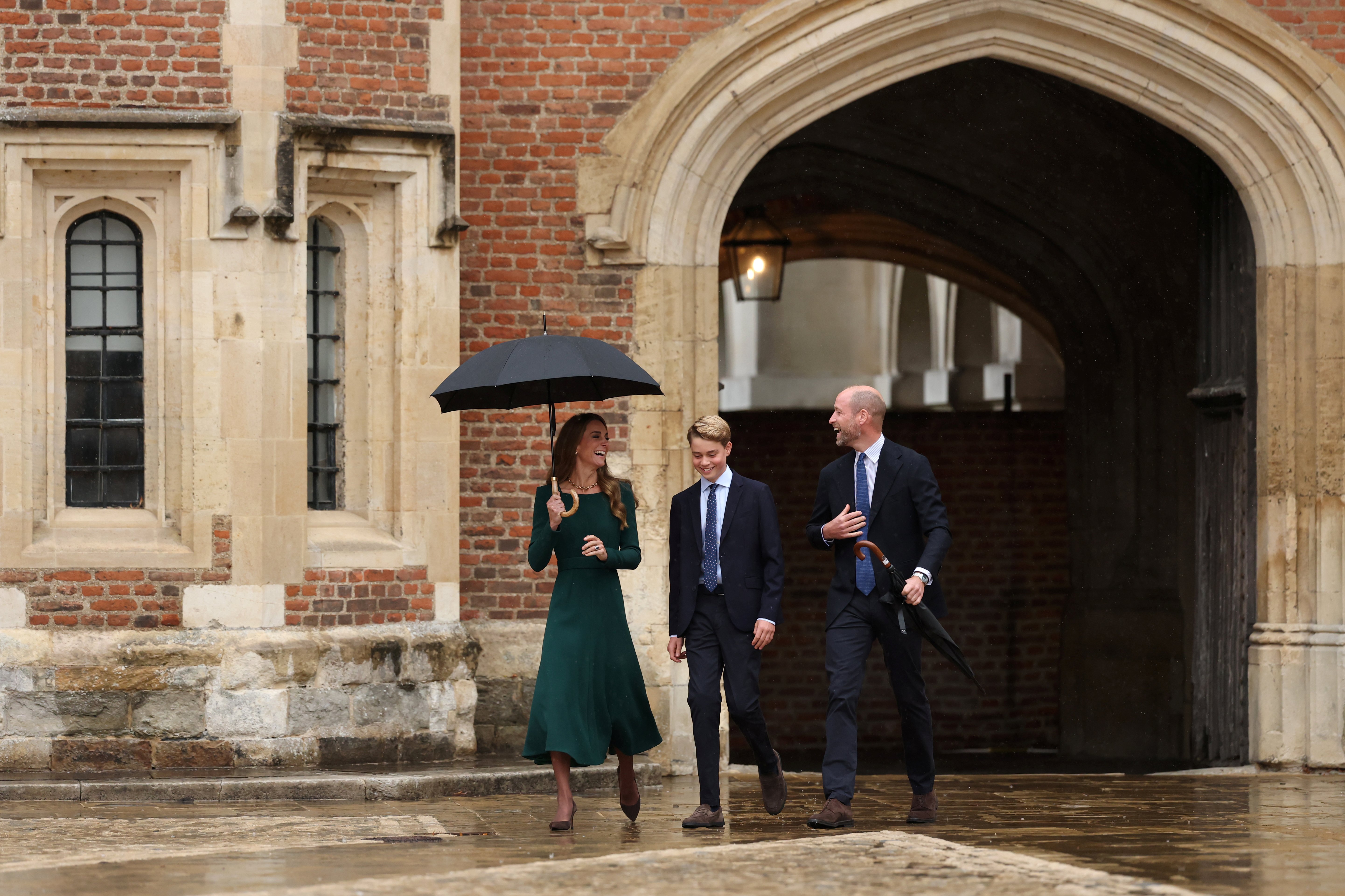 ETON, ENGLAND - SEPTEMBER 8: Catherine, Princess of Wales (L) and Prince William, Prince of Wales (R) walk with their 13-year-old son, Prince George of Wales (C), as he arrives for his first day at Eton College on September 8, 2026 in Berkshire, England. (Photo by Adrian Dennis - WPA Pool/Getty Images)