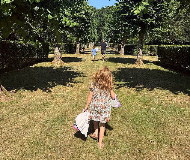 Prince Harry, Prince Archie, and Princess Lillibet walking through Althorp estate to Diana's grave. (Image Source: Instagram | @meghan)