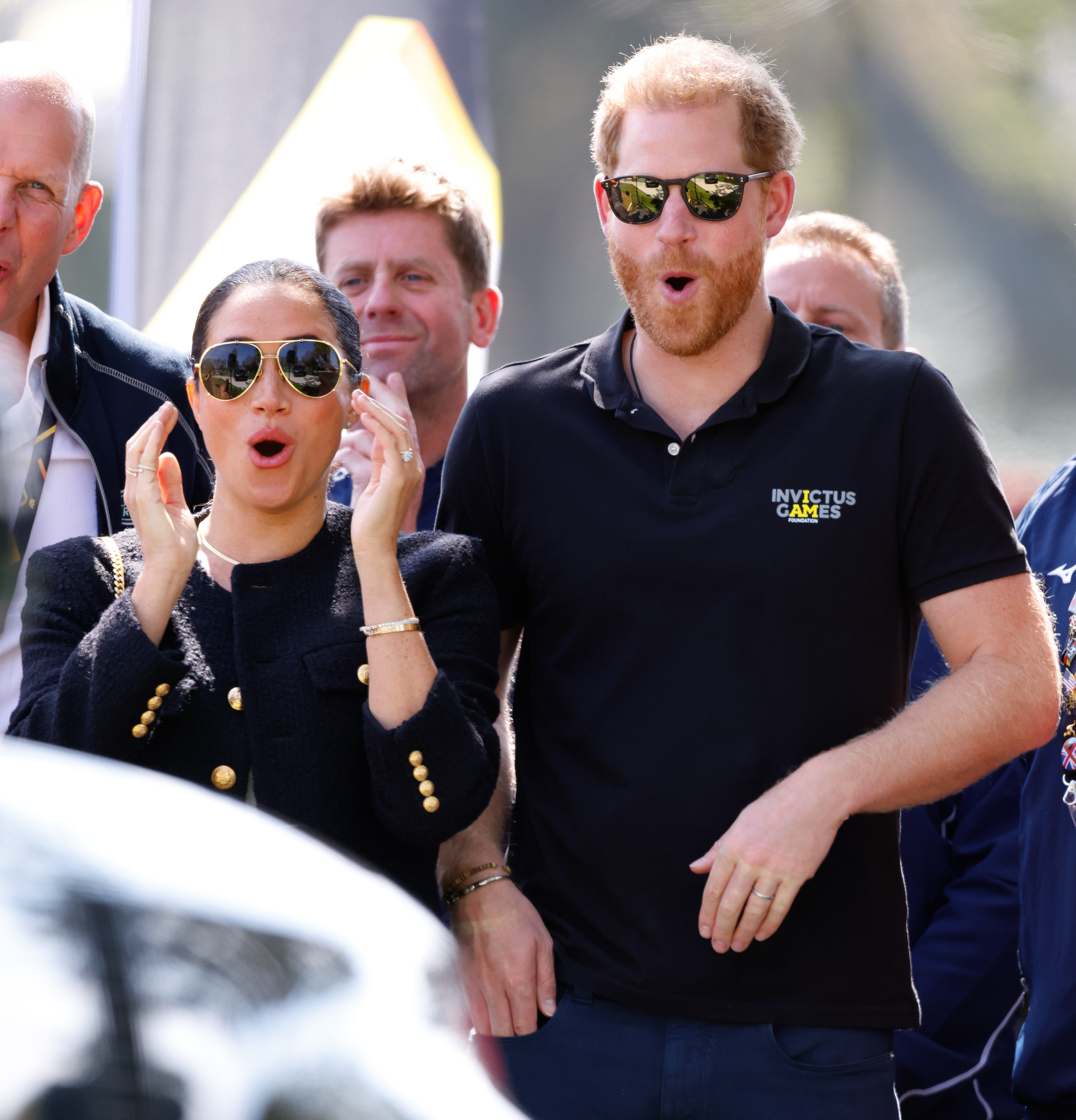 THE HAGUE, NETHERLANDS - APRIL 16: (EMBARGOED FOR PUBLICATION IN UK NEWSPAPERS UNTIL 24 HOURS AFTER CREATE DATE AND TIME) Meghan, Duchess of Sussex and Prince Harry, Duke of Sussex react as they watch the Land Rover Driving Challenge, on day 1 of the Invictus Games 2020 at Zuiderpark on April 16, 2022 in The Hague, Netherlands. (Photo by Max Mumby/Indigo/Getty Images)
