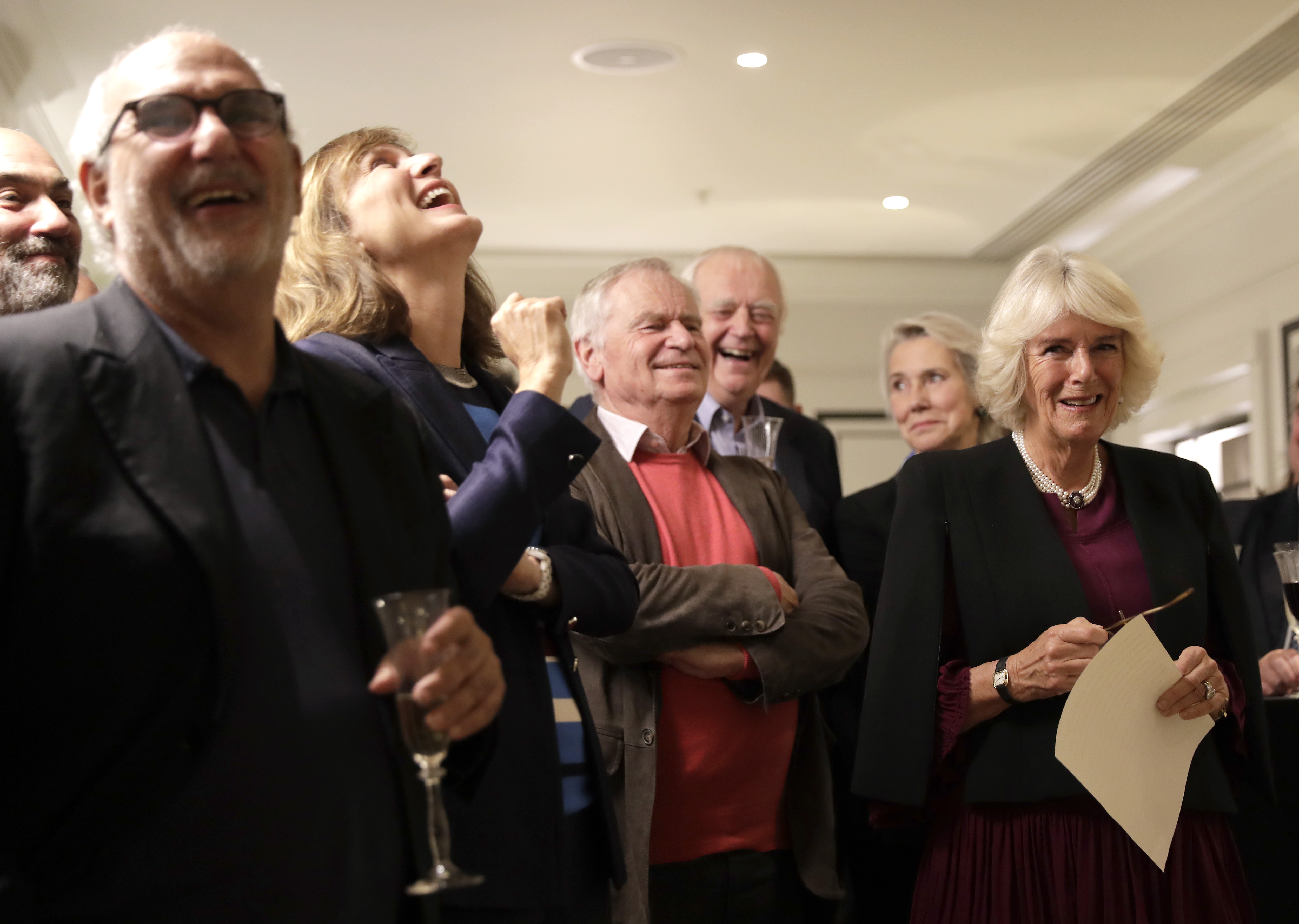 LONDON, ENGLAND - OCTOBER 15: Camilla, Duchess of Cornwall (R) with (L-R) Alan Yentob, Fiona Bruce, Jeffrey Archer and Tim Rice as she attends a reception hosted by Gyles Brandreth, President of the Oscar Wilde Society, to mark the anniversary of the author's birth at the Grosvenor House London on October 15, 2019 in London, United Kingdom. (Photo by John Phillips - WPA Pool/Getty Images)