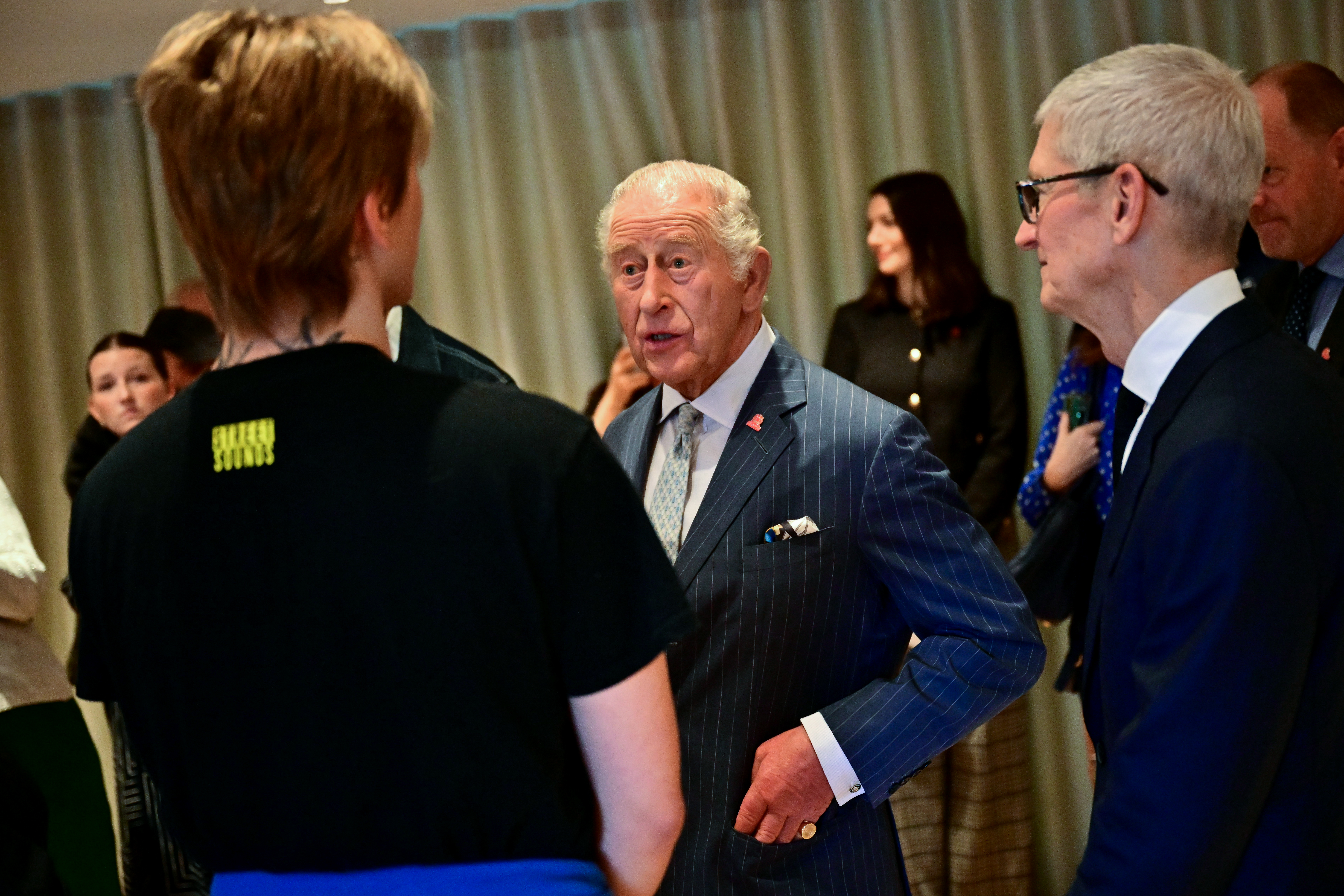 King Charles III speaks to a mentor during a visit to a music workshop for young people, the first as part of the Apple x King's Trust Creative Labs, at Battersea Power Station on October 7, 2026, in London, England. (Photo by Ben Stansall - WPA Pool/Getty Images)