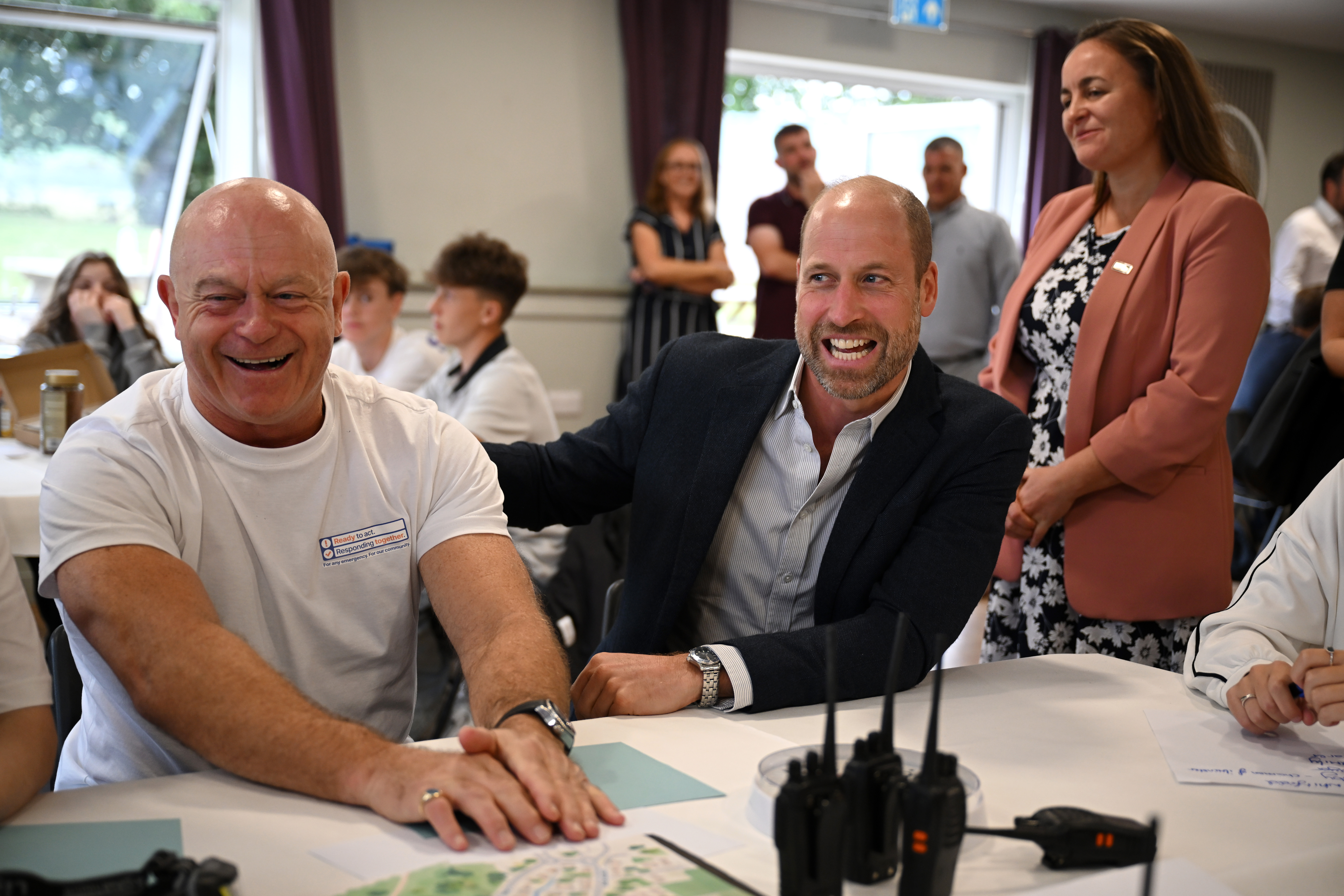 ILMINSTER, ENGLAND - OCTOBER 06: Prince William, Prince of Wales and Ross Kemp take part in a training exercise during his visit to the launch of the National Emergency Trust's