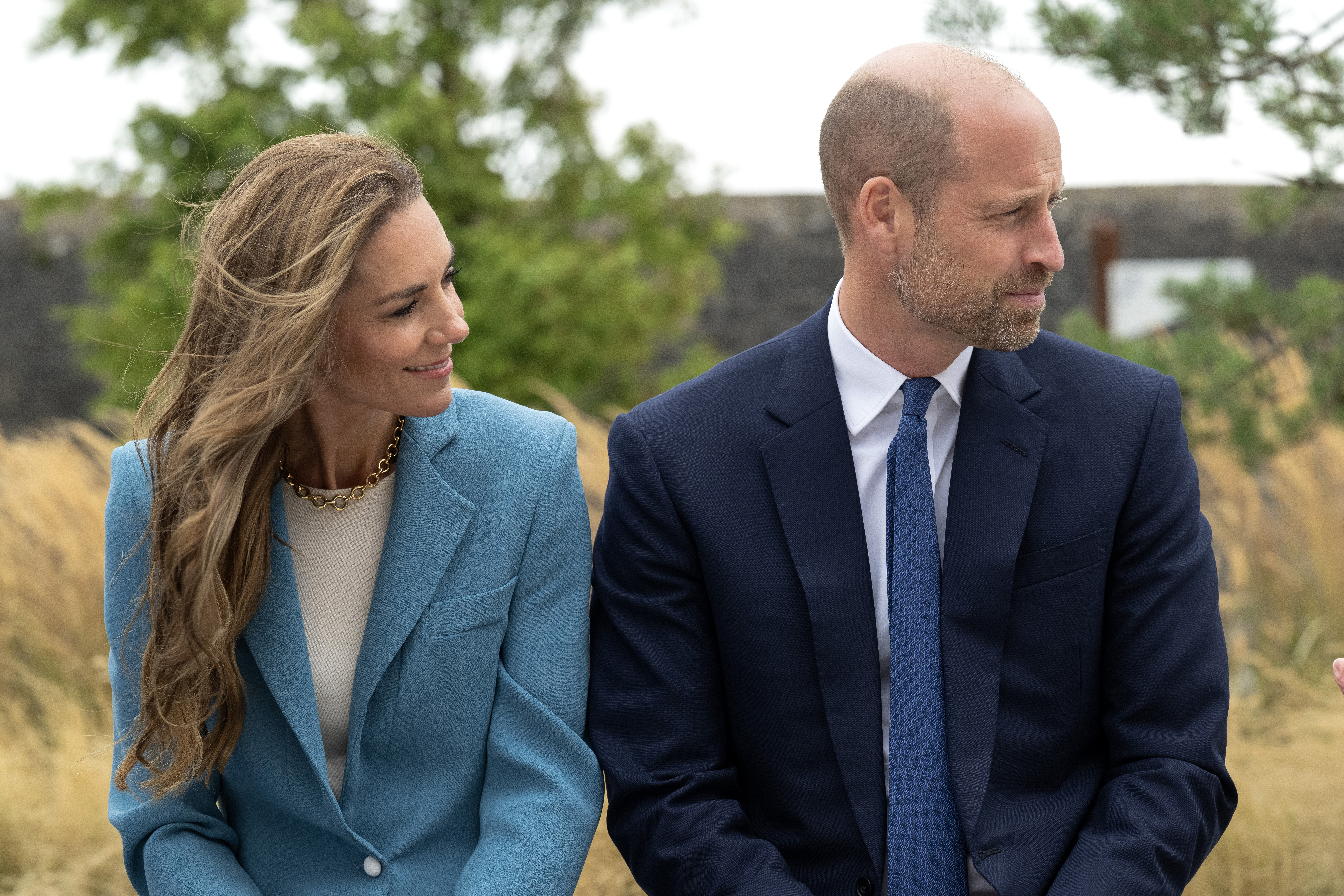 LIVERPOOL, ENGLAND - SEPTEMBER 10: Catherine, Princess of Wales and Prince William, Prince of Wales speak about the stigma surrounding mental health sat on the Gary Speed memorial bench with the late footballer’s mum, Carol, and Sam who has been supported by Everton in the Community during the launch of a Suicide Prevention Toolkit on World Suicide Prevention Day at Hill Dickinson Stadium on September 10, 2026 in Liverpool, England. The Prince of Wales and The Royal Foundation have launched
