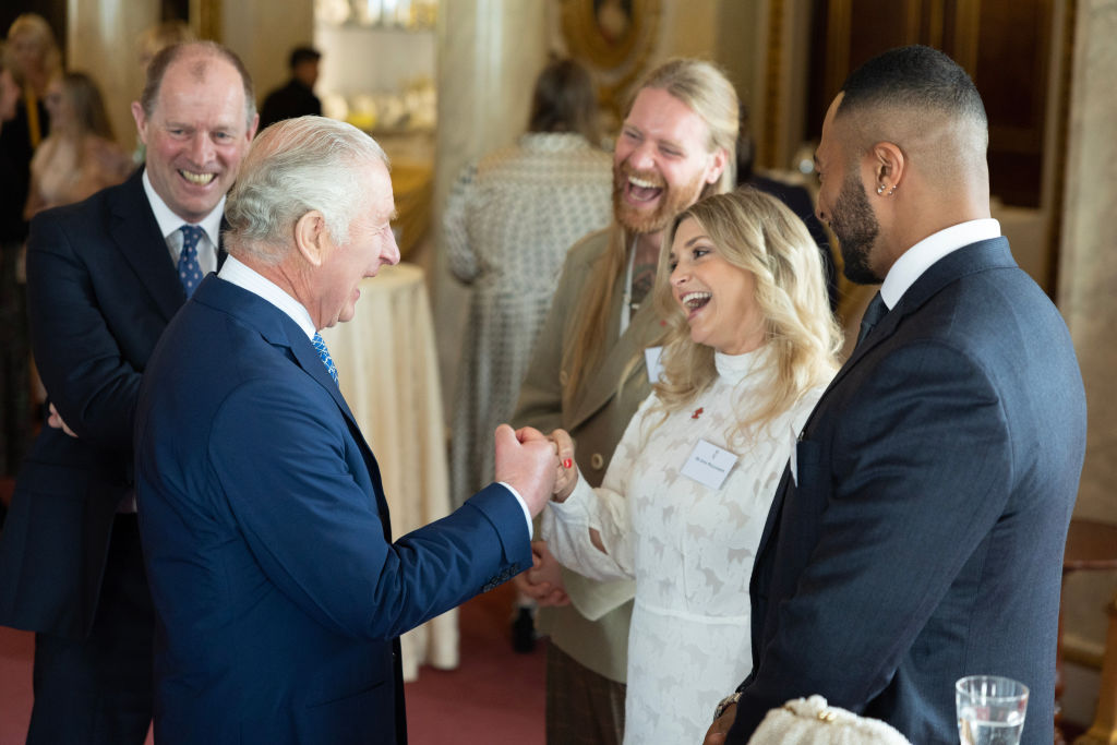 LONDON, ENGLAND - MAY 17: King Charles III meets Sam Ryder (C) and TV presenter Anna Williamson as he hosts the winners of the Prince's Trust awards and celebrity ambassadors at Buckingham Palace on May 17, 2023 in London, England. (Photo by Geoff Pugh-WPA Pool/Getty Images)