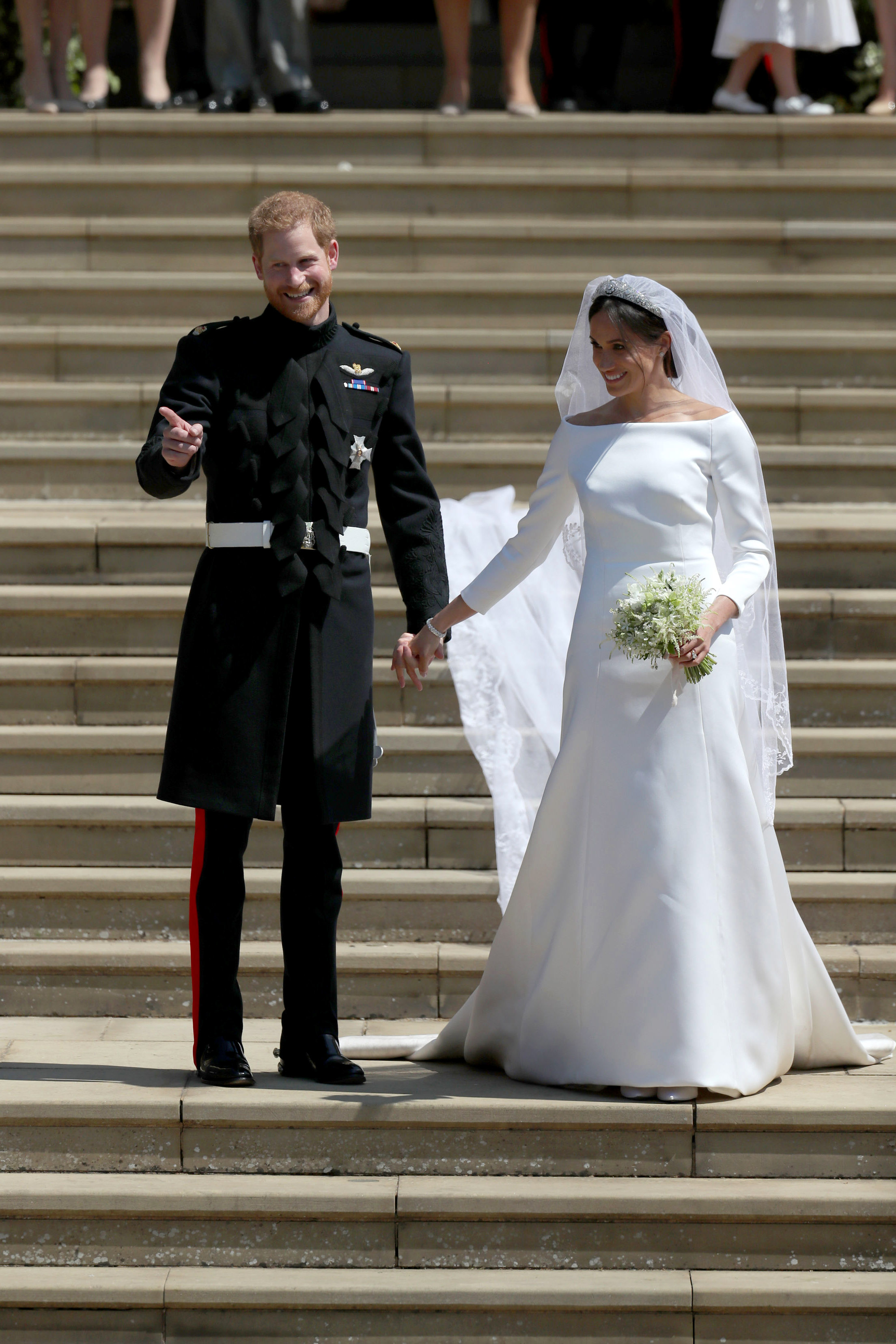 WINDSOR, UNITED KINGDOM - MAY 19:  Prince Harry and Meghan Markle leave St George's Chapel after their wedding in St George's Chapel at Windsor Castle on May 19, 2018 in Windsor, England. (Photo by Jane Barlow - WPA Pool/Getty Images)