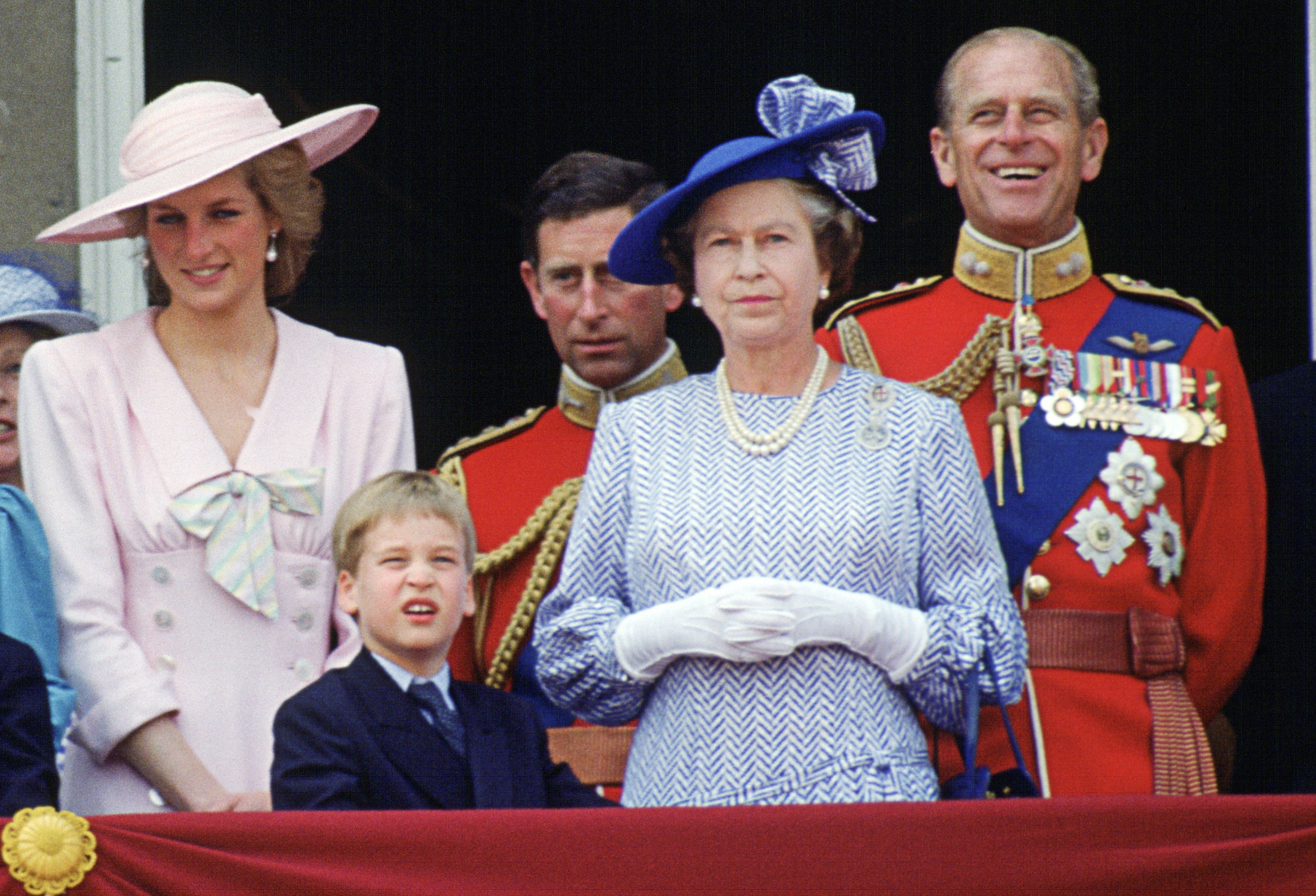 UNITED KINGDOM - JUNE 17:  Queen Elizabeth II, Prince Philip, Prince Charles, Diana Princess of Wales and Prince William stand on the balcony of Buckingham Palace for Trooping The Colour.  Hat by Philip Somerville.  (Photo by Tim Graham Photo Library via Getty Images)