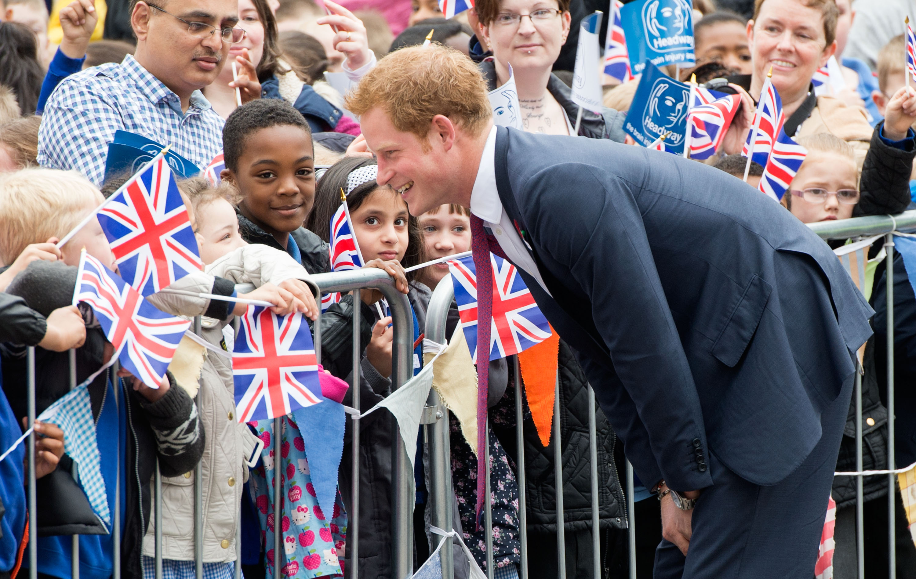 NOTTINGHAM, ENGLAND - APRIL 25: Prince Harry meets children as he visits Headway, the brain injury association at Bradbury House during an official visit to Nottingham on April 25, 2013 in Nottingham, England. (Photo by Samir Hussein/WireImage) *** Local Caption *** Prince Harry