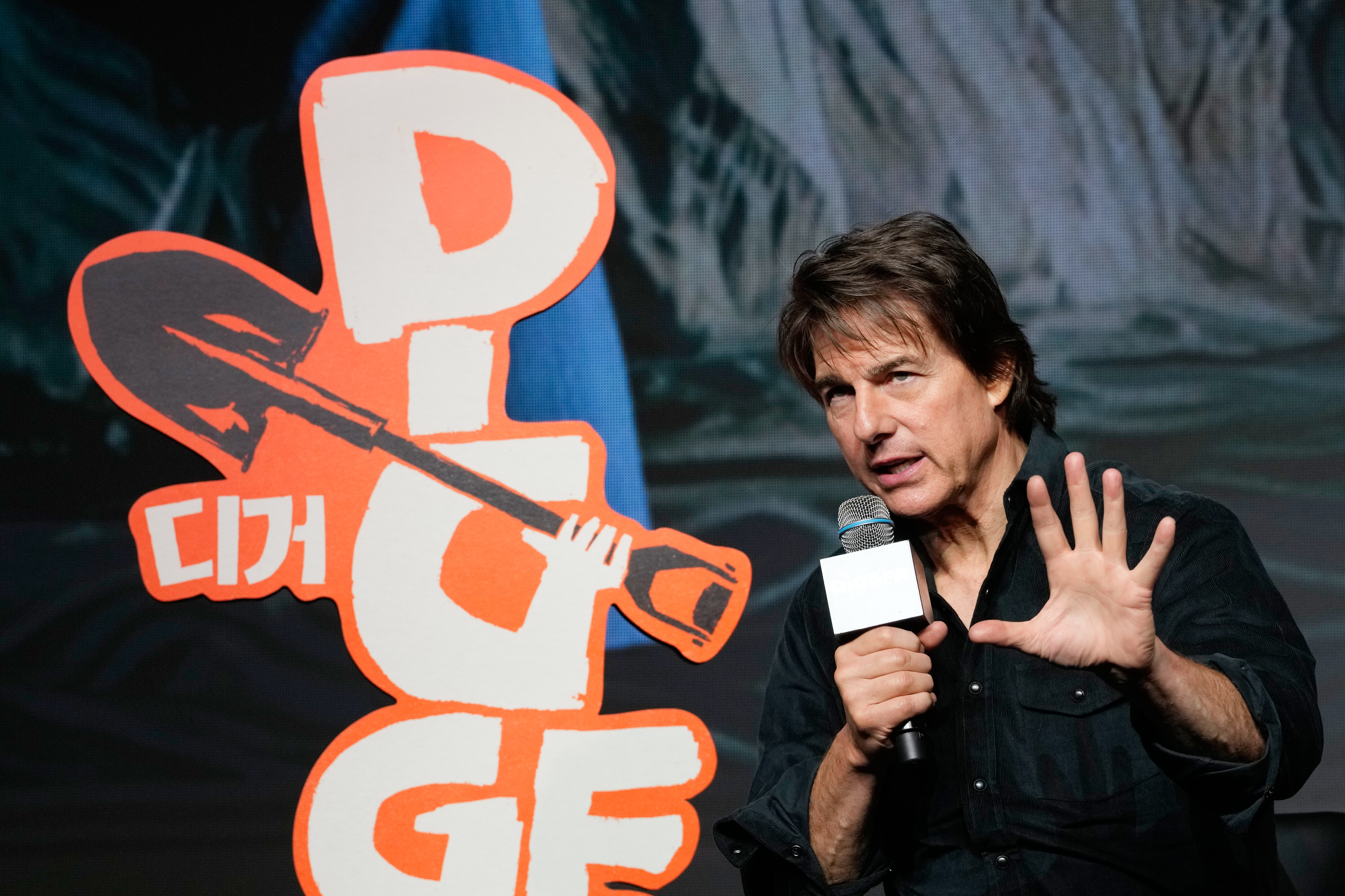 Tom Cruise speaks during a press conference to promote his latest film