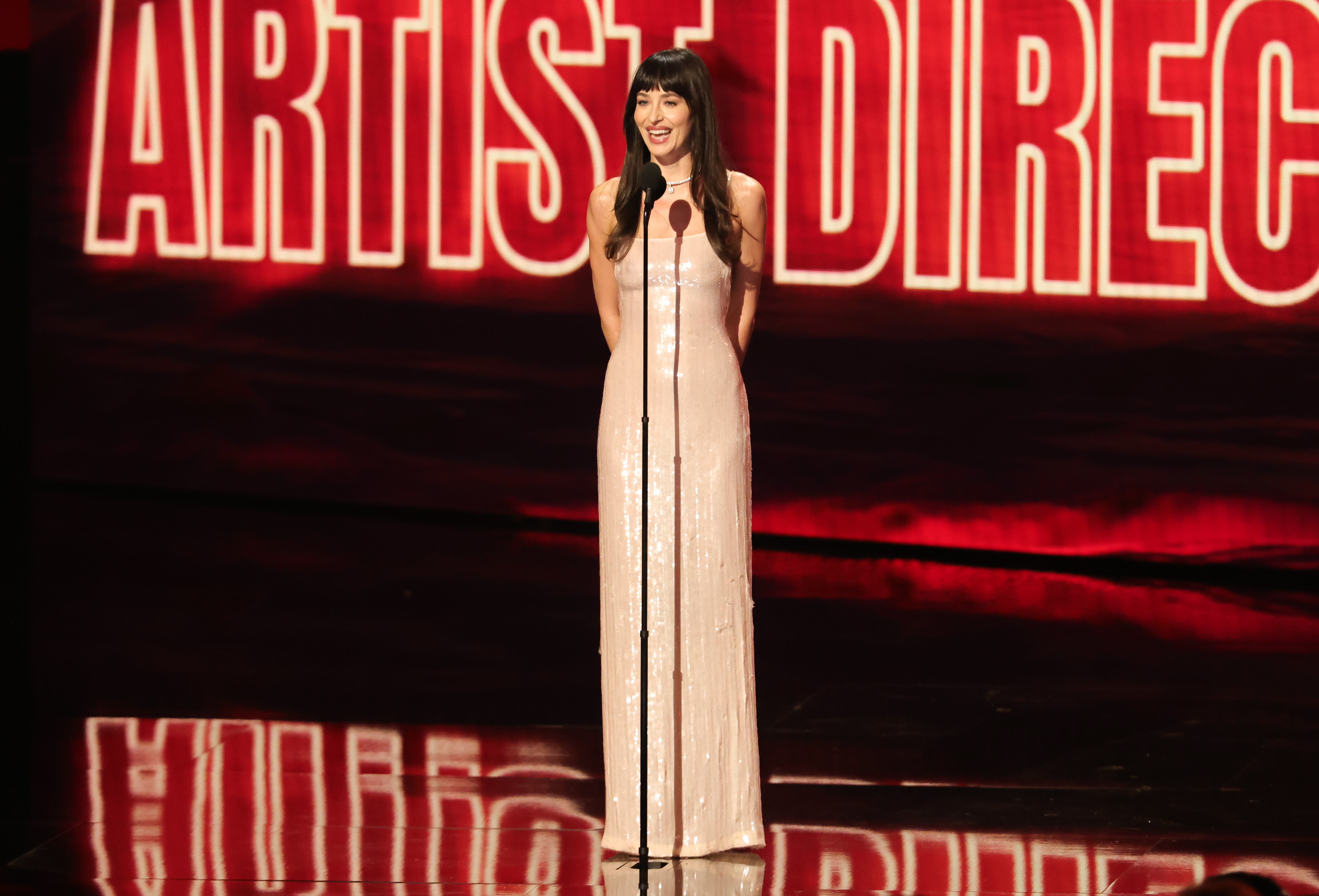 LOS ANGELES, CALIFORNIA - SEPTEMBER 27: Dakota Johnson speaks onstage during the 2026 MTV Video Music Awards (VMAs) at Peacock Theater on September 27, 2026 in Los Angeles, California. (Photo by Kevin Winter/Getty Images)