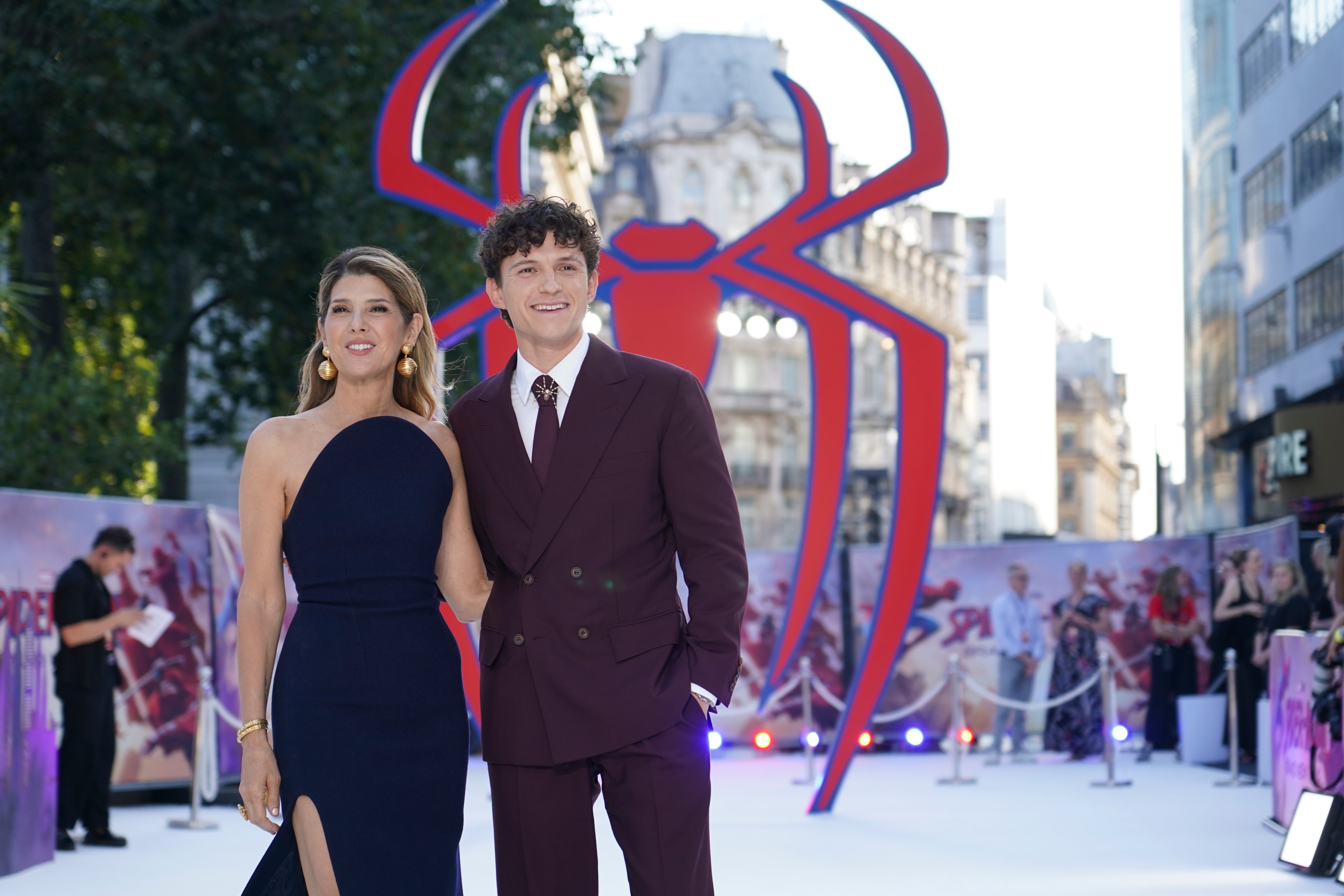 Tom Holland and Marisa Tomei react pose for photographers upon arrival at the 'Spider-Man: Brand New Day' premiere in London, England, Wednesday, July 29, 2026. (Photo by Alberto Pezzali/Invision/AP)