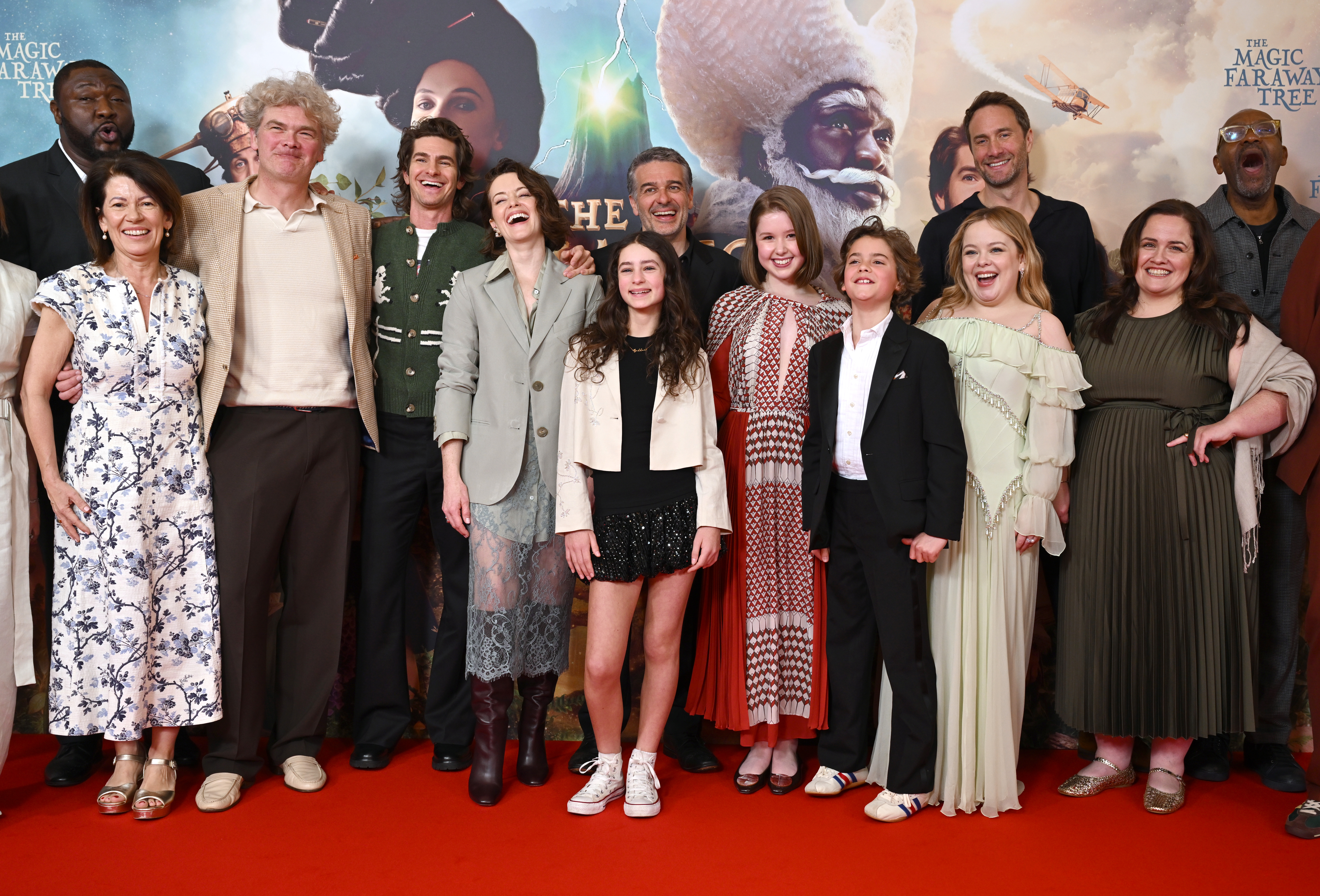 LONDON, ENGLAND - MARCH 22: (L-R) Nonso Anozie, Dame Pippa Harris, Simon Farnaby, Andrew Garfield, Claire Foy, Billie Gadsdon, Ben Gregor, Delilah Bennett-Cardy, Phoenix Laroche, Nicola Coughlan, Oliver Chris, Jessica Gunning and Sir Lenny Henry attend