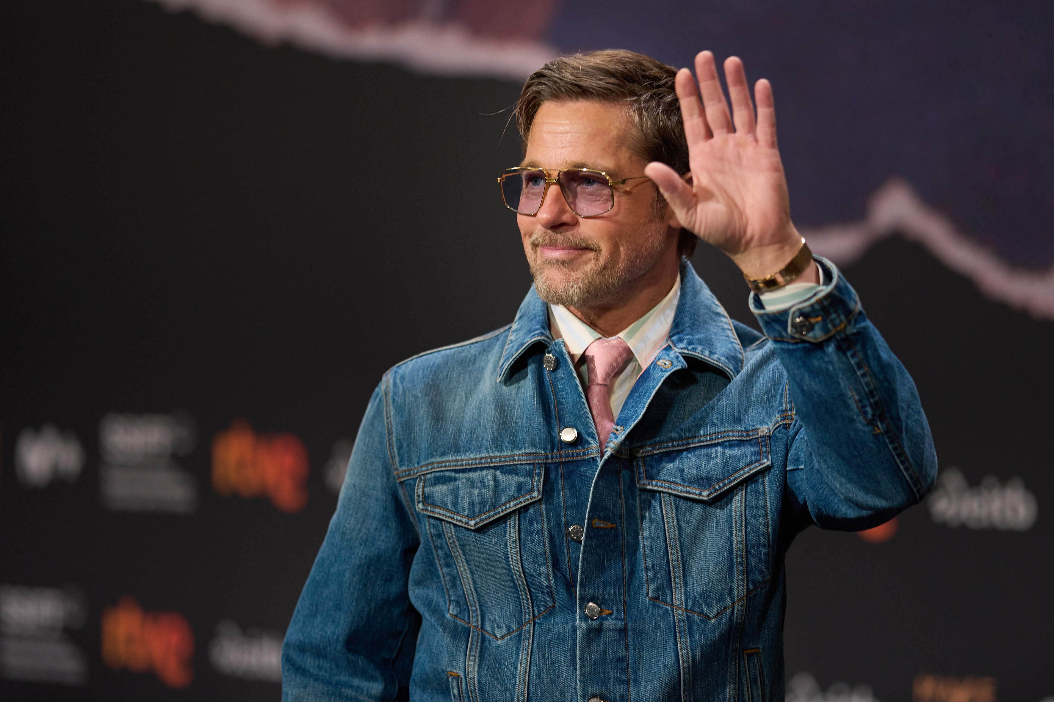 Brad Pitt waves during a press conference at the 74th edition of the San Sebastián Film Festival in San Sebastian, northern Spain, Wednesday, Sept. 23, 2026. (AP Photo/Miguel Oses)