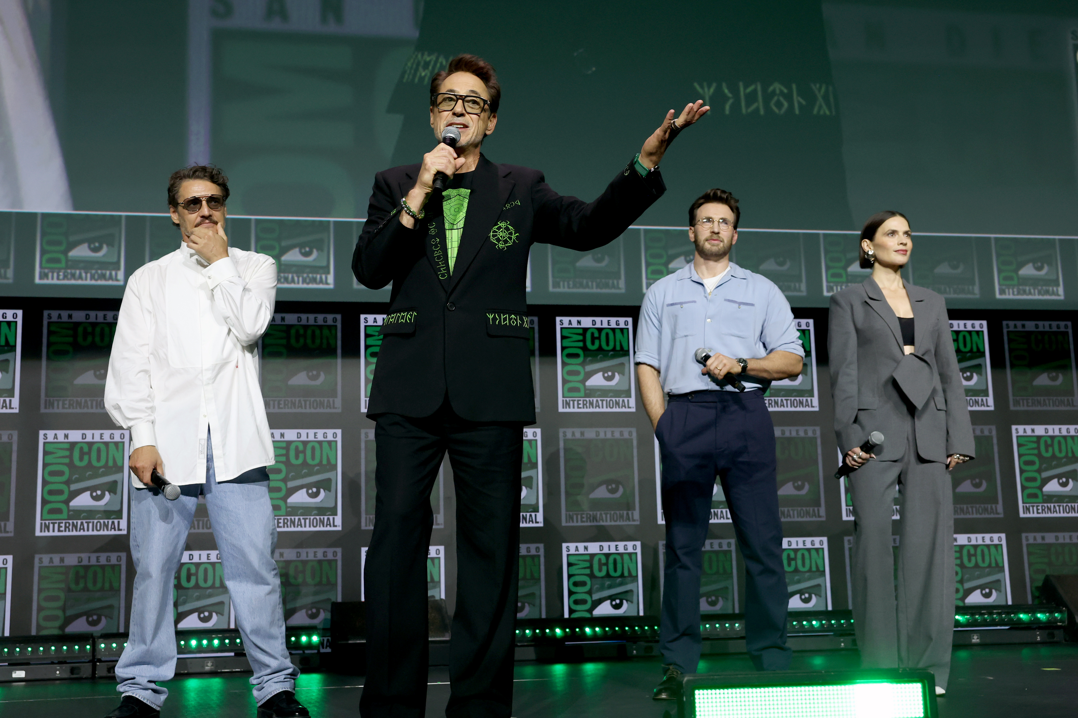 SAN DIEGO, CALIFORNIA - JULY 25: (L-R) Pedro Pascal, Robert Downey Jr., Chris Evans and Hayley Atwell speak onstage during the Marvel Studios Panel at 2026 San Diego Comic-Con on July 25, 2026 in San Diego, California. (Photo by Jesse Grant/Getty Images for Disney)