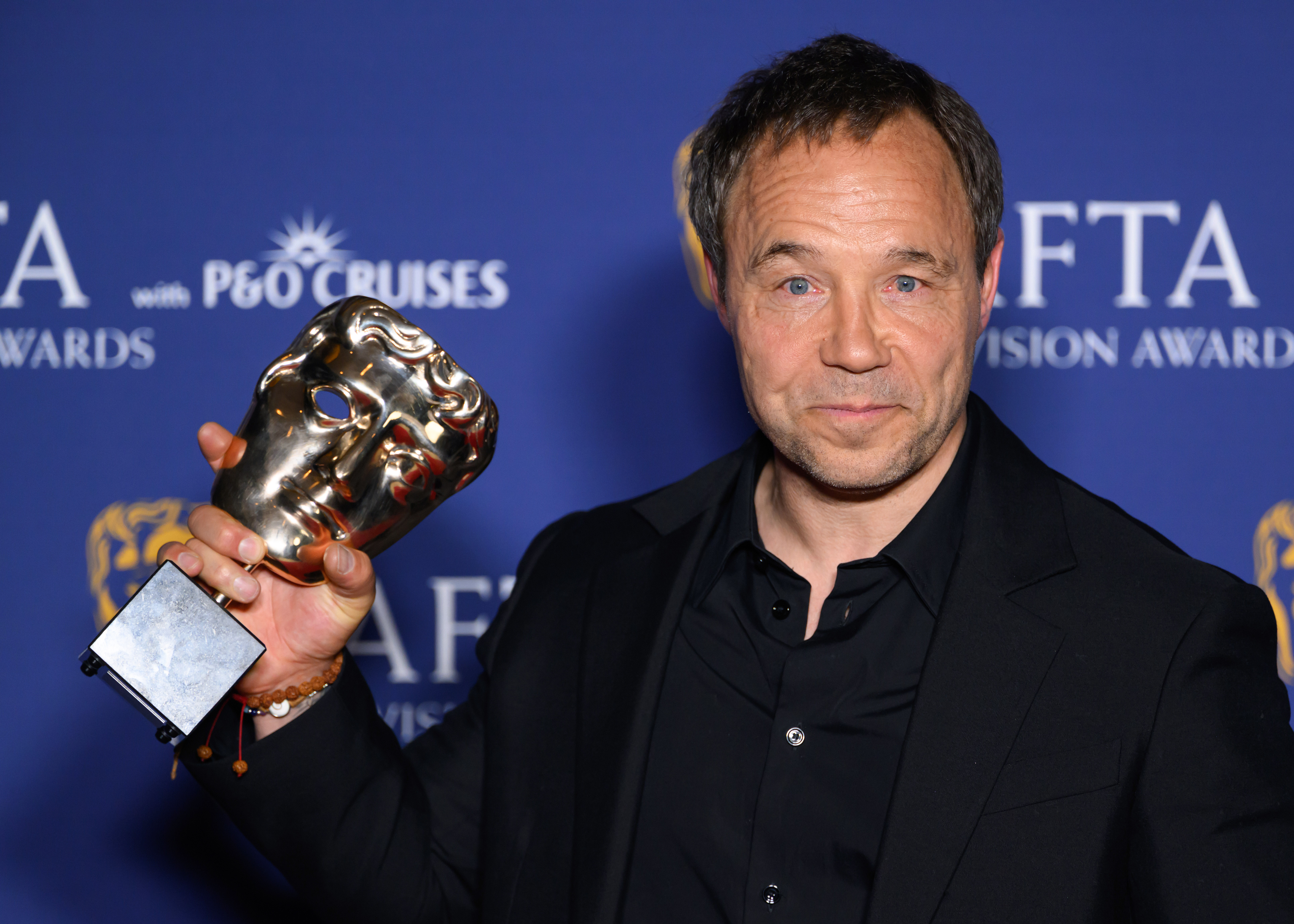LONDON, ENGLAND - MAY 10: Stephen Graham with the Leading Actor Award for Adolescence during the BAFTA Television Awards with P&O Cruises 2026 at The Royal Festival Hall on May 10, 2026 in London, England. (Photo by Karwai Tang/WireImage)