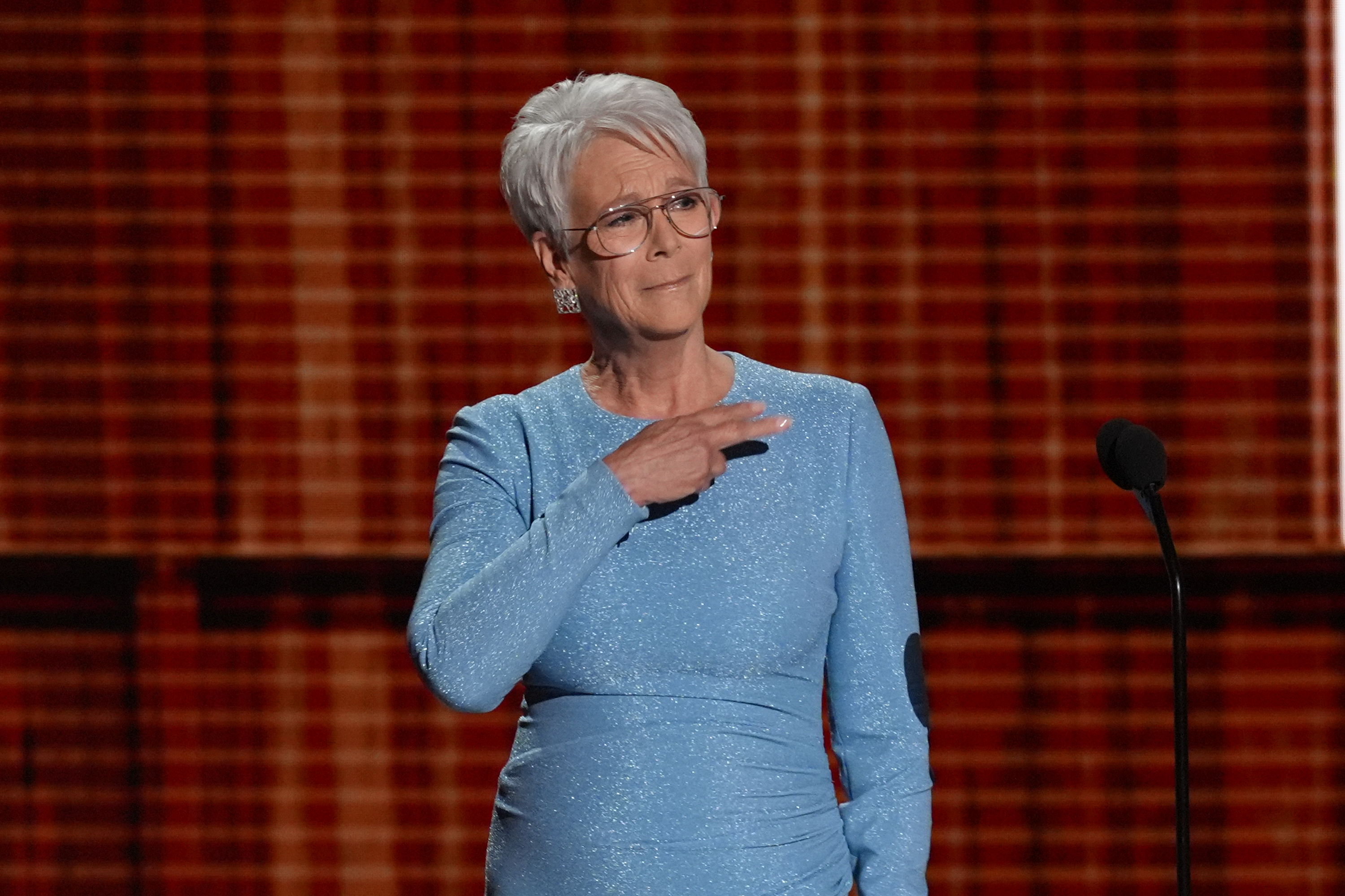 Jamie Lee Curtis pays tribute to James Burrows and Rob Reiner during the 78th Emmy Awards on Monday, Sept. 14, 2026, at the Peacock Theater in Los Angeles. (AP Photo/Chris Pizzello)