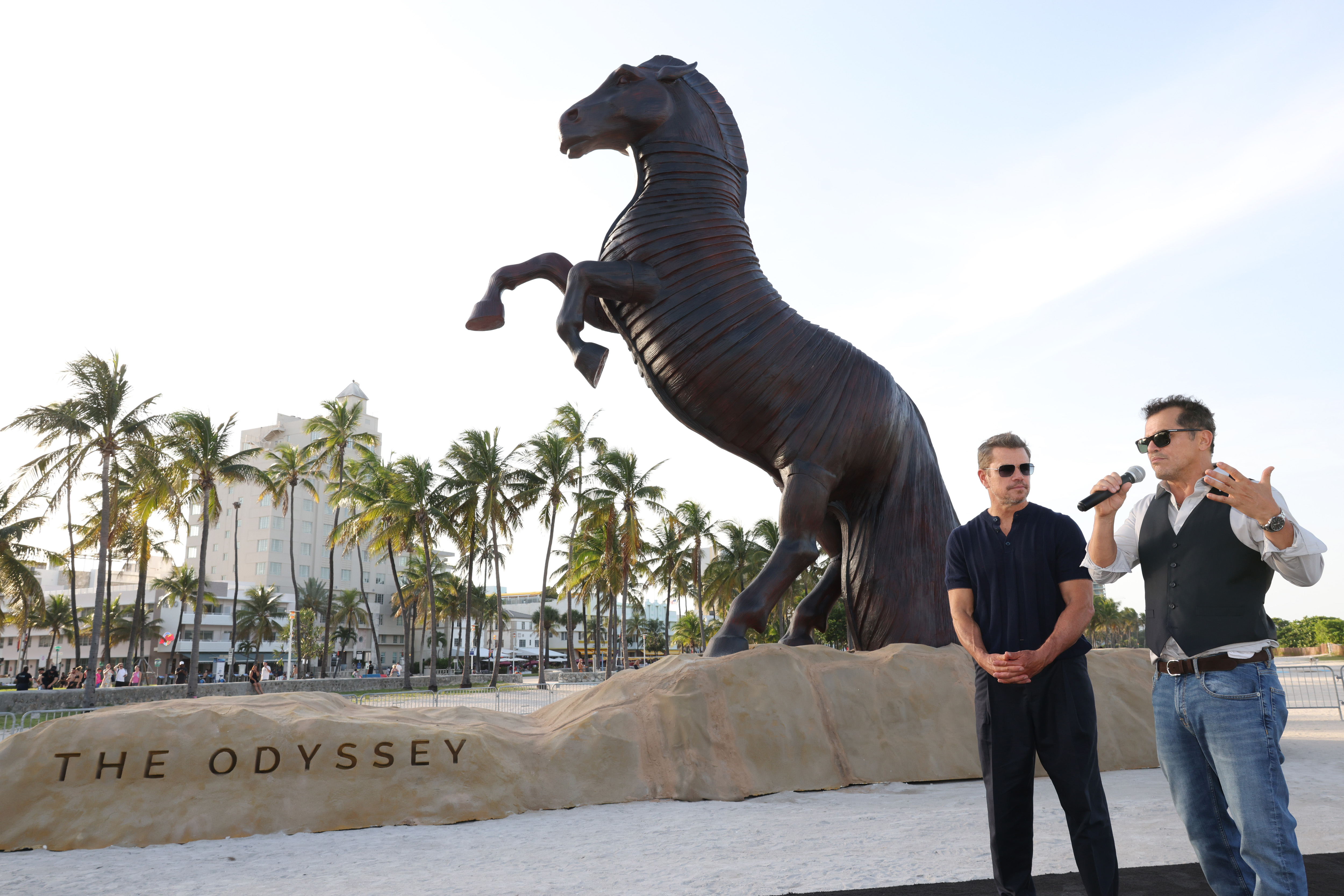 MIAMI, FLORIDA - JUNE 26: Matt Damon and John Leguizamo speak at a special ODYSSEY Miami Photo call presented by Universal Pictures on June 26, 2026 in Miami, Florida. (Photo by Alexander Tamargo/Getty Images for Universal Pictures)