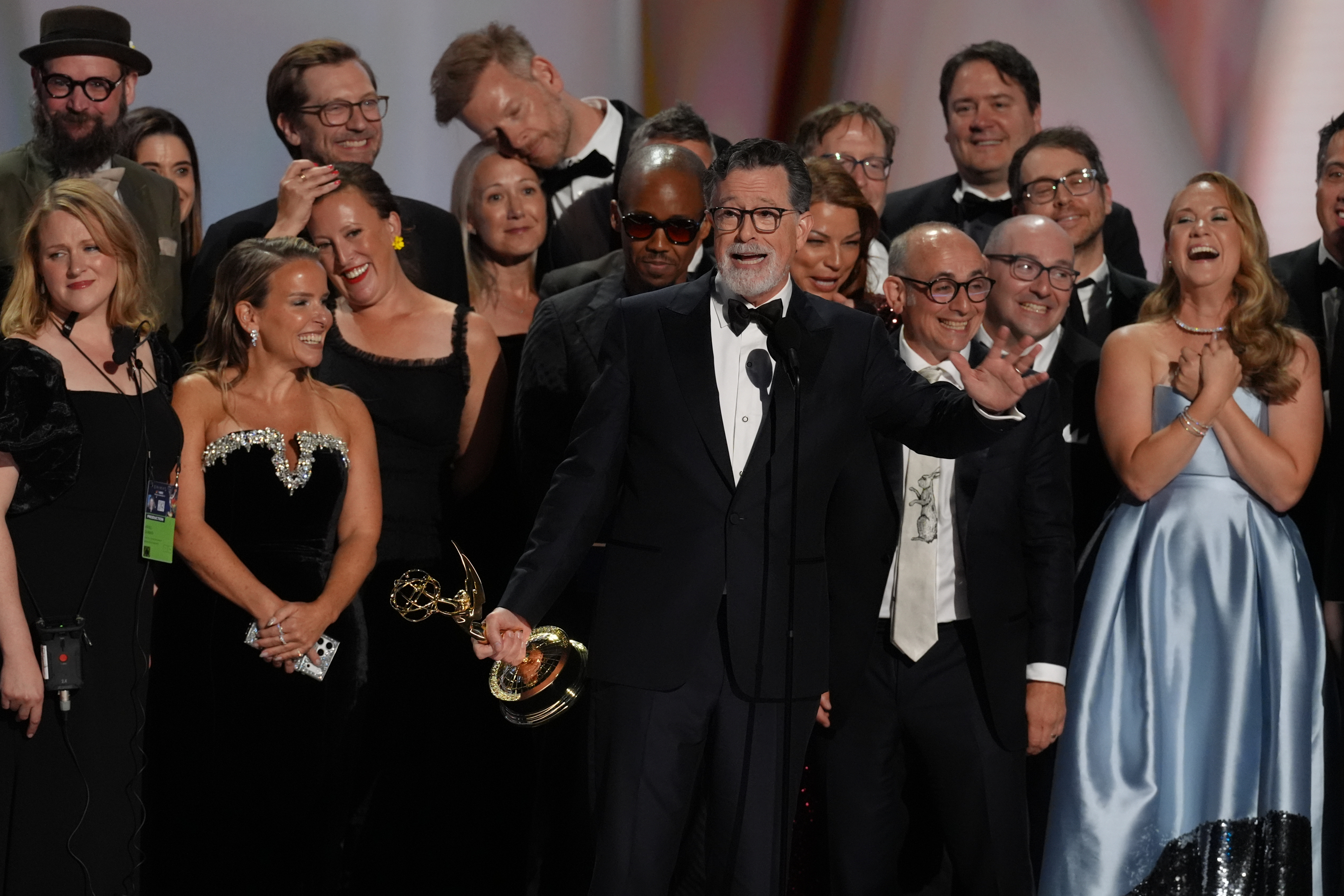 Stephen Colbert, center, and the team from