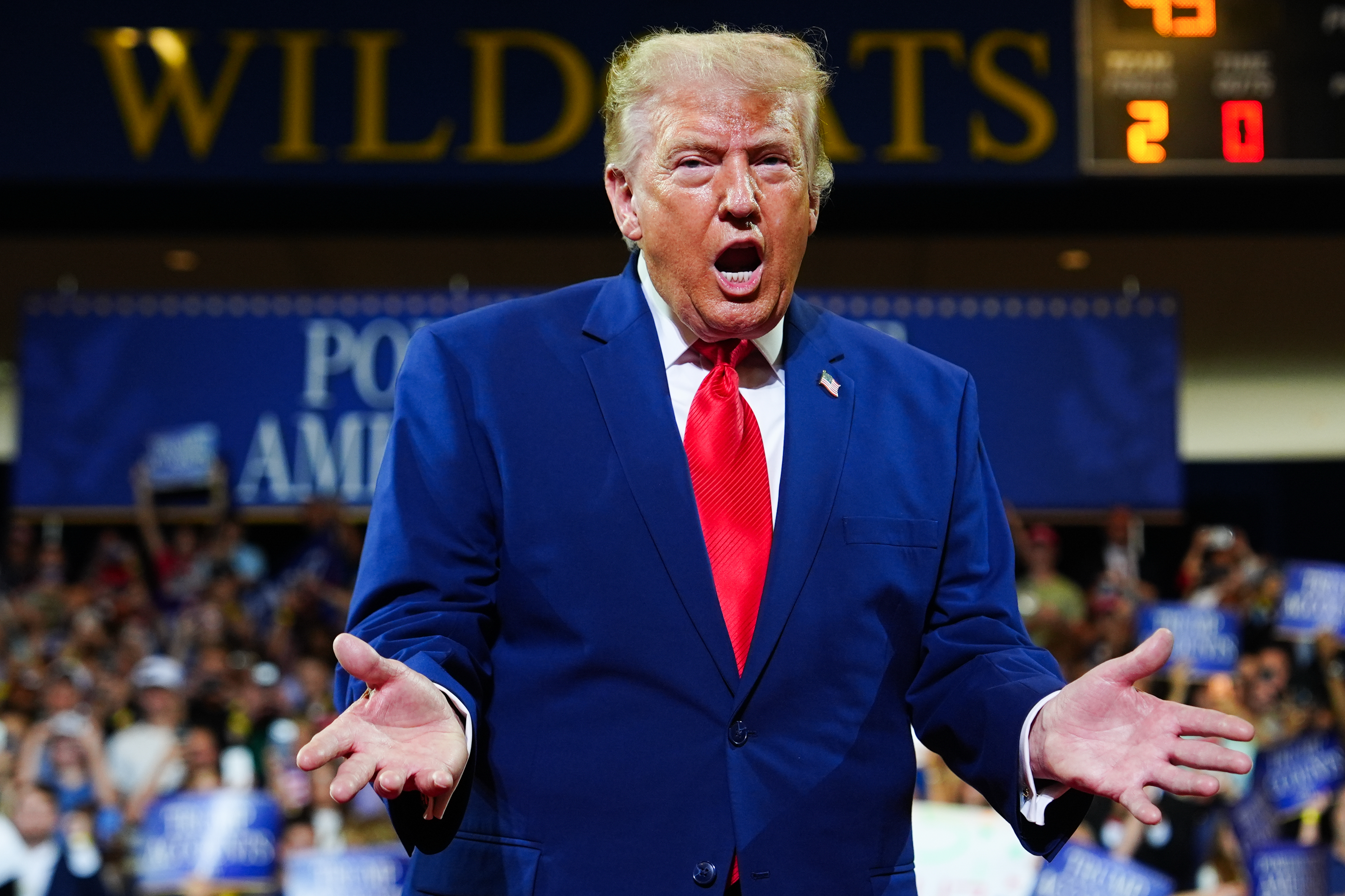President Donald Trump gestures as he arrives to speak at Wheeler High School, Wednesday, July 22, 2026, in Marietta, Ga. (AP Photo/Julia Demaree Nikhinson)
