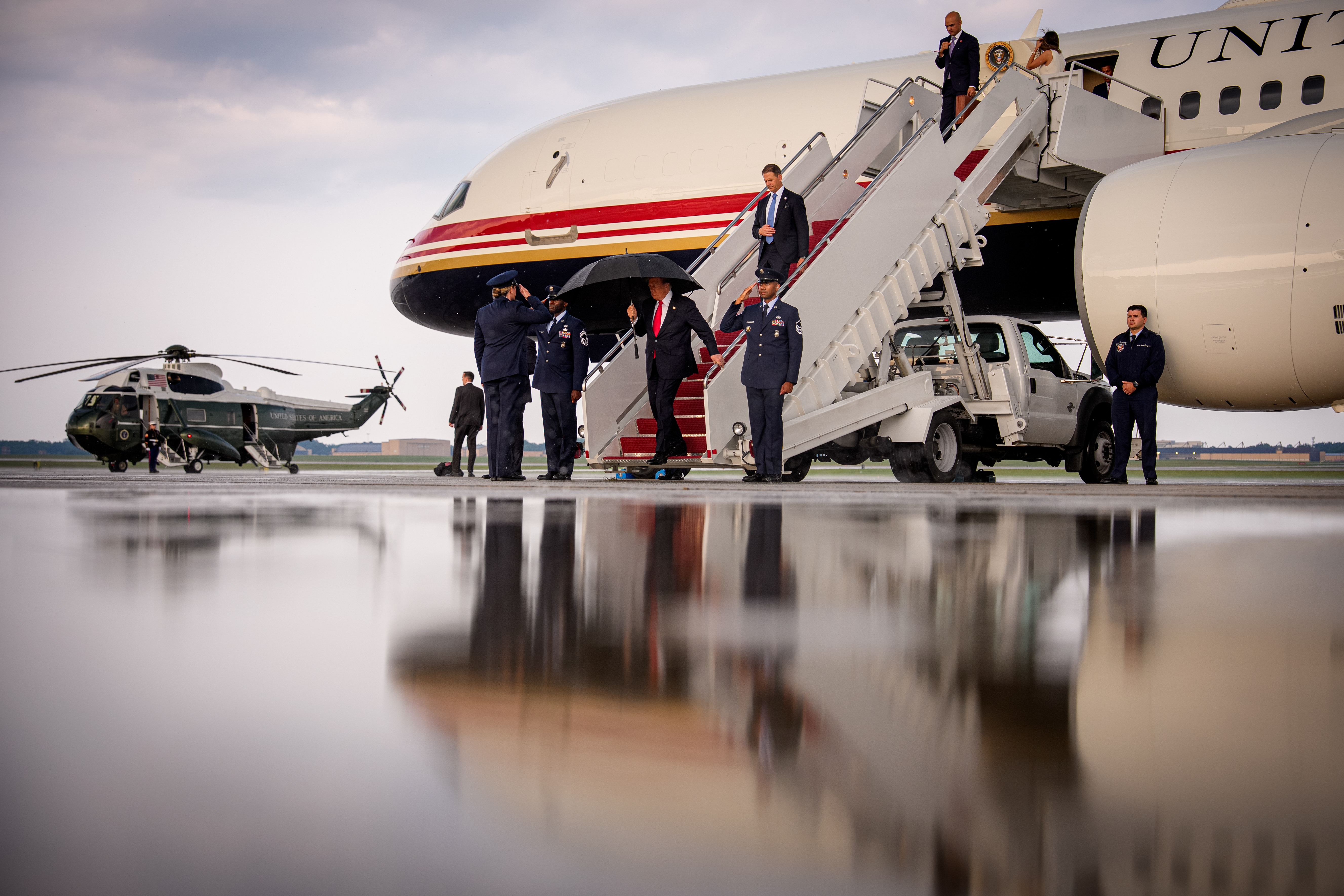 JOINT BASE ANDREWS, MARYLAND - JULY 27: U.S. President Donald Trump returns from a trip to Michigan on July 27, 2026 at Joint Base Andrews, Maryland. Trump visited the General Motors' Milford Proving Ground facility and spoke to supporters about U.S. auto manufacturing, tariffs, and supporting Republican candidates ahead of the August 4 primary. (Photo by Andrew Harnik/Getty Images)