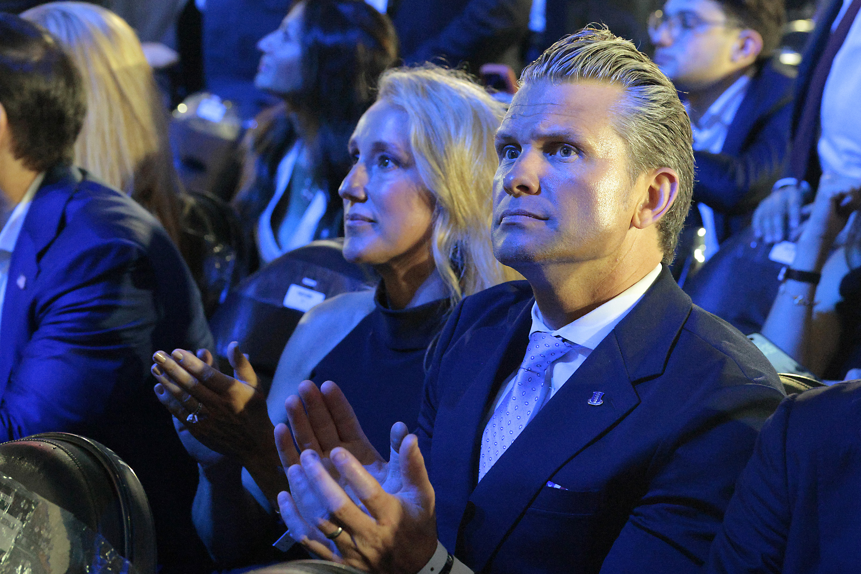WASHINGTON, DC - JUNE 15: U.S. Secretary of Defense Pete Hegseth and his wife, Jennifer Rauchet, attend UFC Freedom 250 on the South Lawn of the White House on June 15, 2026 in Washington, DC. President Trump is hosting a series of Ultimate Fighting Championship matches on his 80th birthday, which the White House is calling