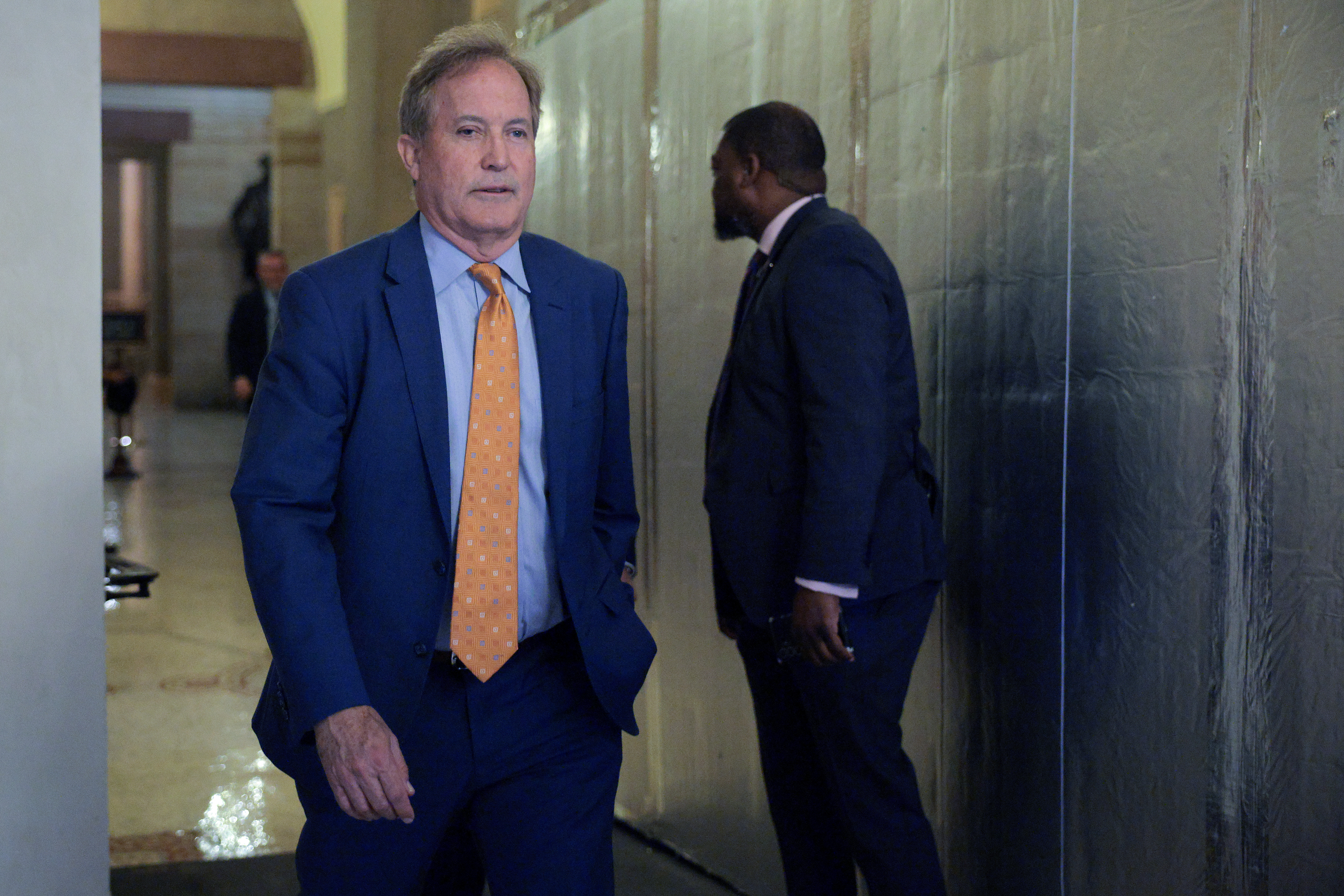 WASHINGTON, DC - JUNE 03: Texas Attorney General Ken Paxton (C) leaves Senate Majority Leader John Thune's (R-SD) office at the U.S. Capitol on June 03, 2026 in Washington, DC. The Republican nominee for U.S. Senate in Texas, Paxton was endorsed by U.S. President Donald Trump. (Photo by Chip Somodevilla/Getty Images)