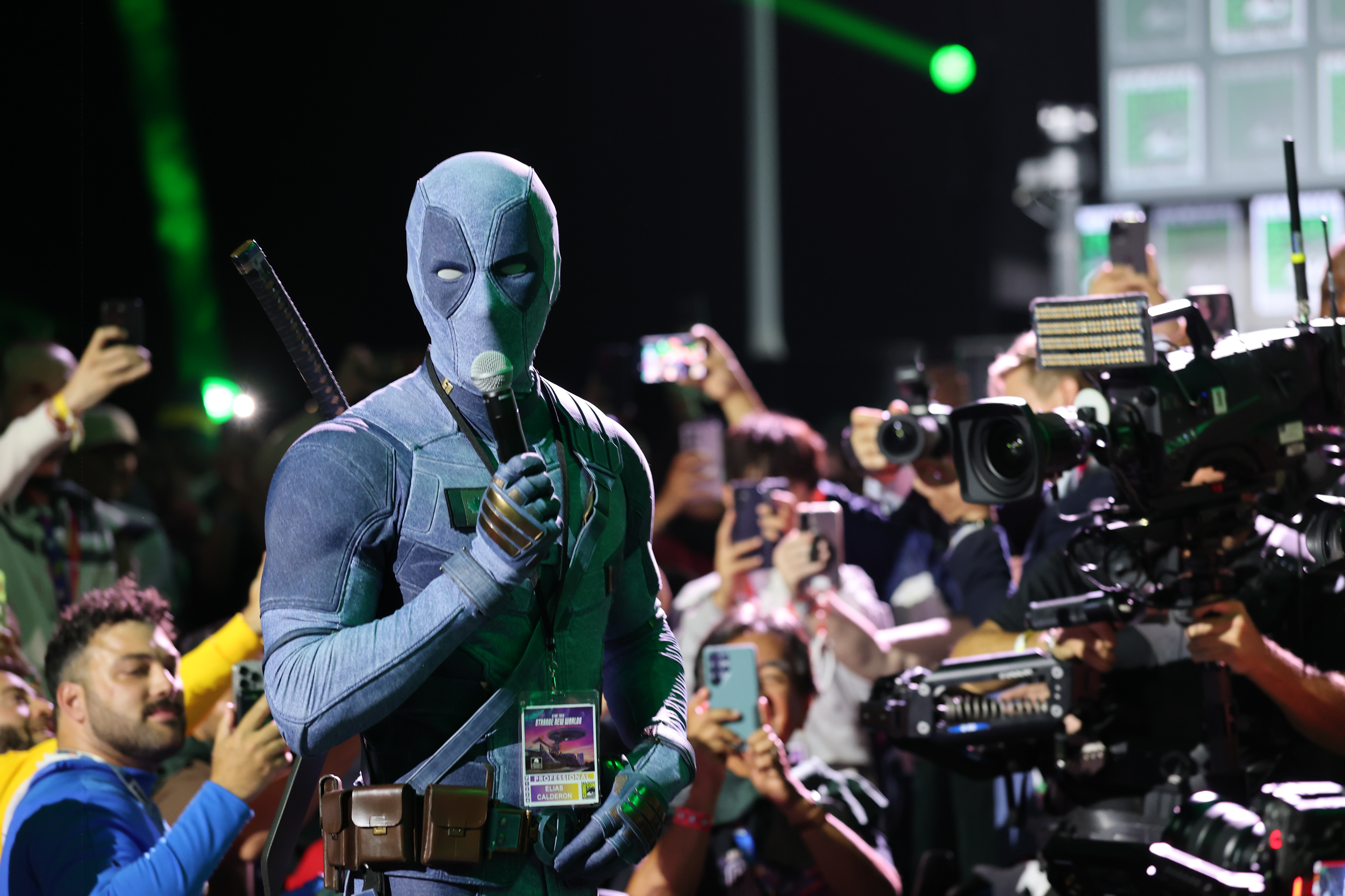 SAN DIEGO, CALIFORNIA - JULY 25: Ryan Reynolds in Deadpool cosplay speaks during the 2026 Comic-Con International: San Diego - Marvel Studios Hall H presentation at San Diego Convention Center on July 25, 2026 in San Diego, California. (Photo by Amy Sussman/Getty Images)