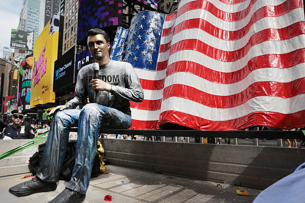 NEW YORK, NEW YORK - SEPTEMBER 10: A statue of conservative founder of Turning Point USA, Charlie Kirk, is displayed in New York’s Times Square moments after its unveiling on the one-year anniversary of his assassination on September 10, 2026, in New York City. Italian-born artist Sergio Furnari made the statue of the controversial activist, and it was displayed on the back of a truck that departed immediately after the unveiling.  (Photo by Spencer Platt/Getty Images)