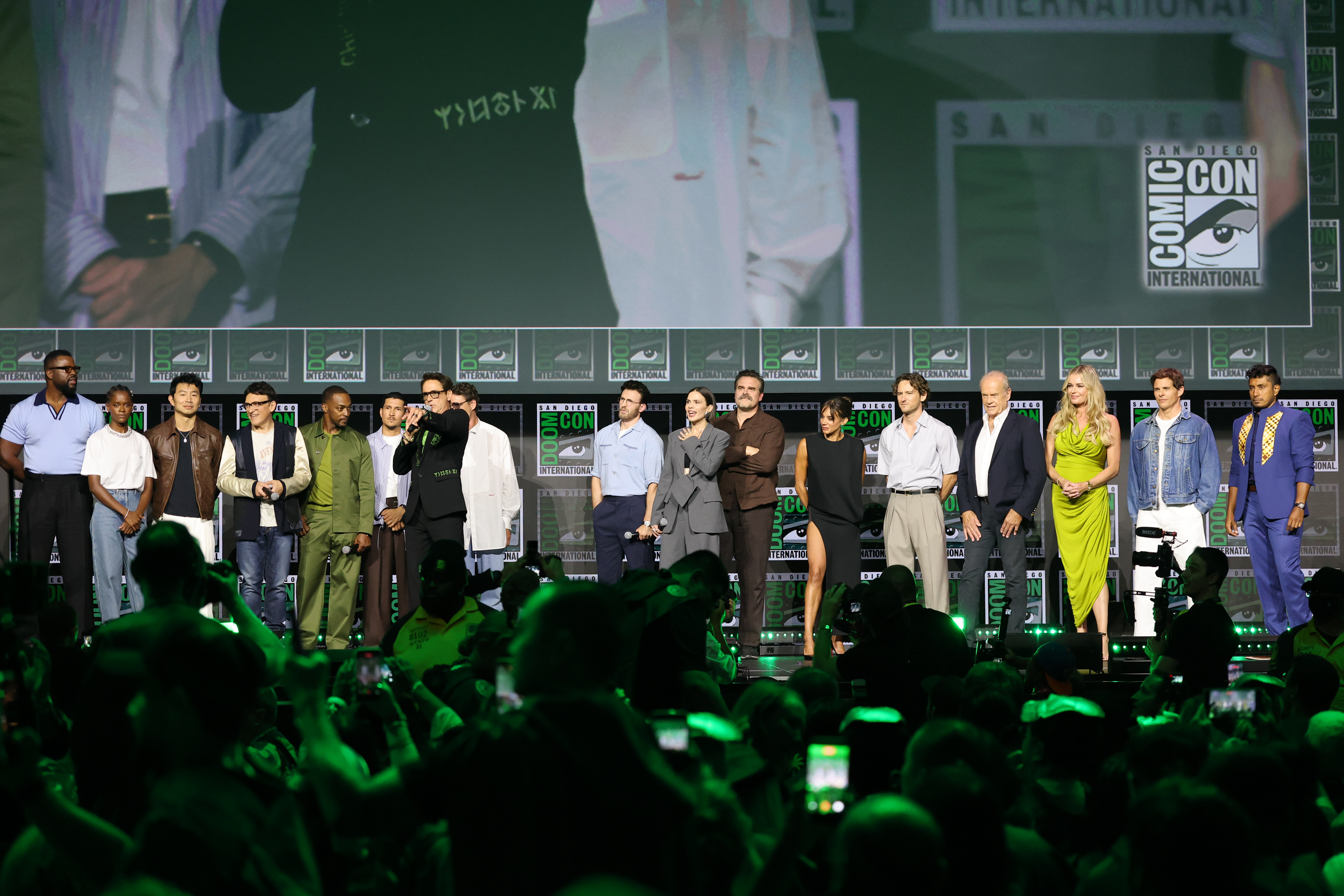 SAN DIEGO, CALIFORNIA - JULY 25: (L-R) Winston Duke, Letitia Wright, Simu Liu, Anthony Russo, Anthony Mackie, Danny Ramirez, Robert Downey Jr., Chris Evans, Hayley Atwell, David Harbour, Hannah John-Kamen, Lewis Pullman, Kelsey Grammer, Rebecca Romijn, James Marsden and Tenoch Huerta speak onstage during the 2026 Comic-Con International: San Diego - Marvel Studios Hall H presentation at San Diego Convention Center on July 25, 2026 in San Diego, California. (Photo by Amy Sussman/Getty Images)