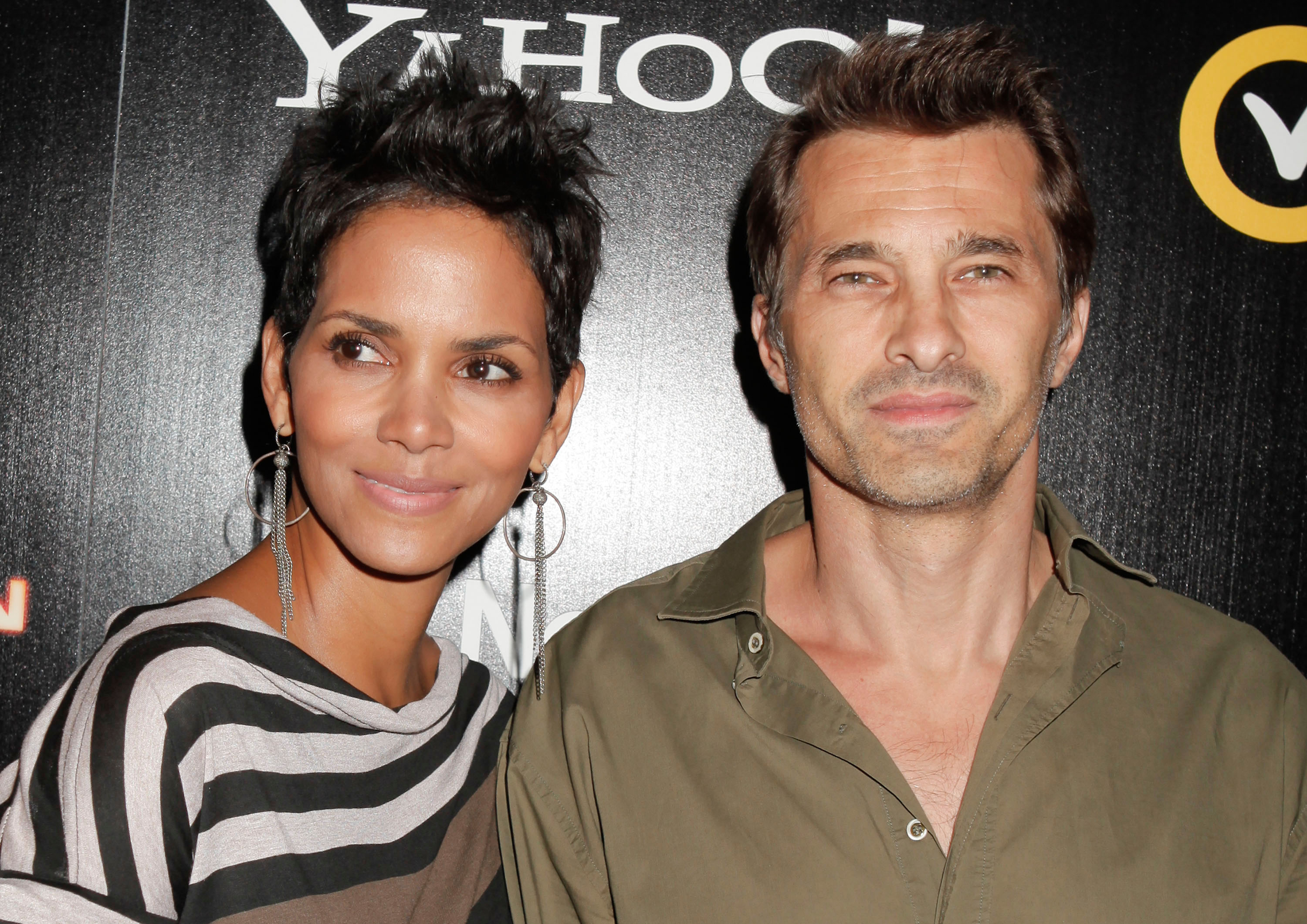WEST HOLLYWOOD, CA - SEPTEMBER 24:  Halle Berry and Olivier Martinez attend the 'Cybergeddon' Los Angeles premiere at Pacfic Design Center on September 24, 2012 in West Hollywood, California.  (Photo by Tibrina Hobson/WireImage)