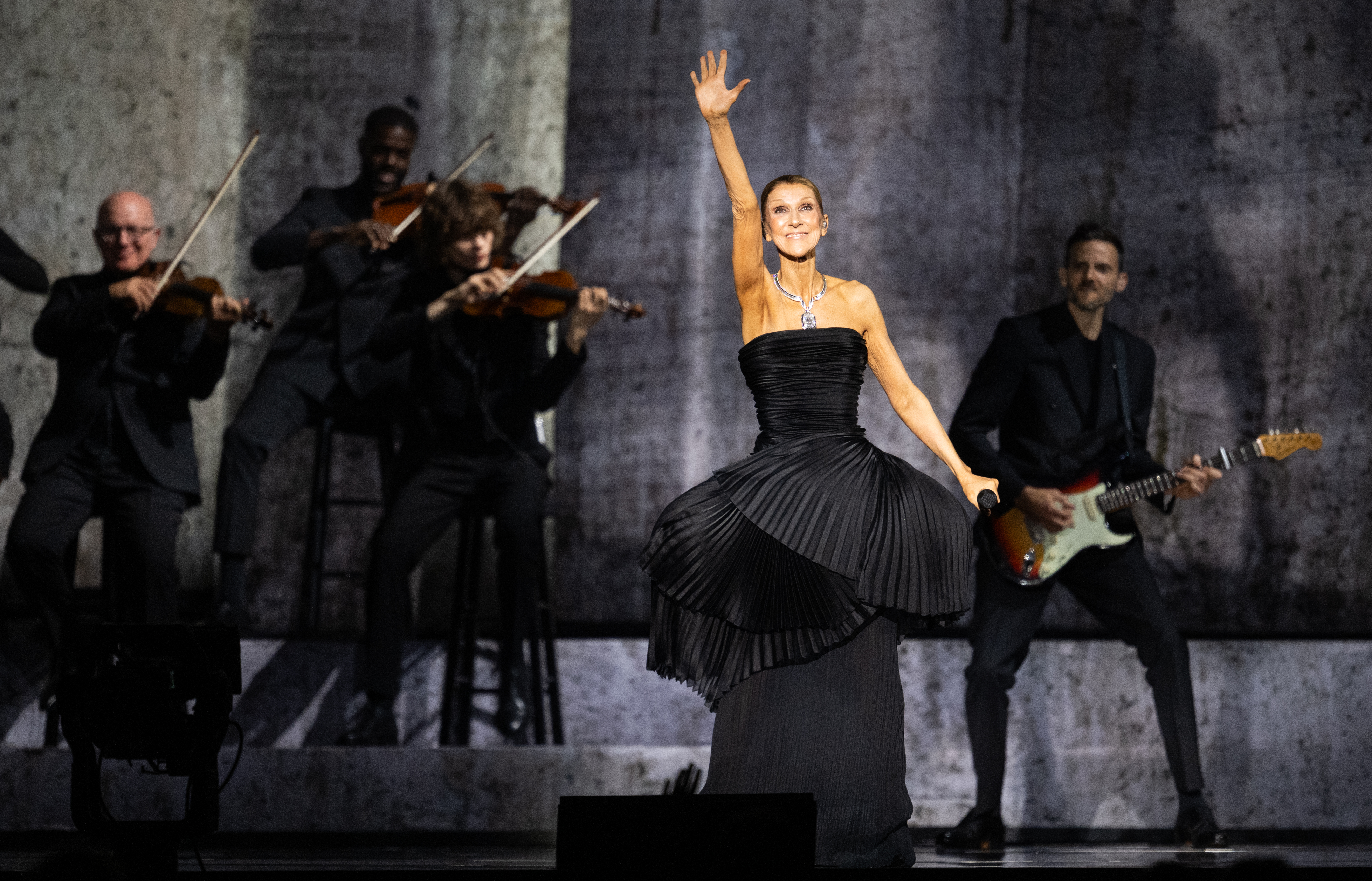NANTERRE, FRANCE - SEPTEMBER 12:  Celine Dion performs on the opening night of her residency at Paris La Defense Arena on September 12, 2026 in Nanterre, France. (Photo by Samir Hussein/WireImage)