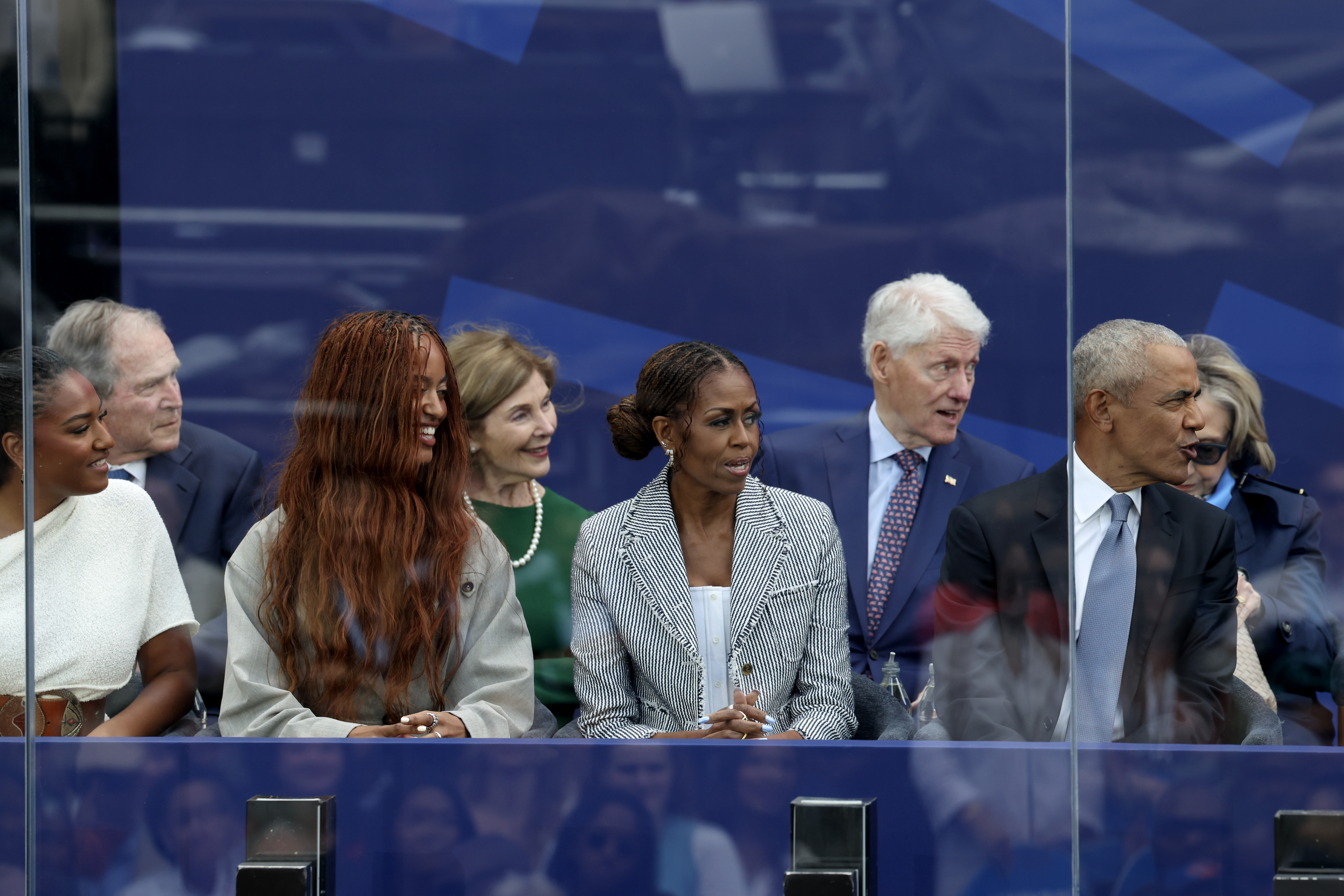 CHICAGO, ILLINOIS - JUNE 18: (L-R) Sasha Obama, Former U.S. President George W. Bush, Malia Obama, former first lady Laura Bush, Former first lady Michelle Obama, Former U.S. President Bill Clinton, and Former U.S. President Barack Obama attend the dedication ceremony for the opening of the Barack Obama Presidential Center in John Lewis Plaza on June 18, 2026 in Chicago, Illinois. Barack Obama served as the 44th president of the United States from 2009 to 2017 and was the first African American to hold the office. (Photo by Scott Olson/Getty Images)