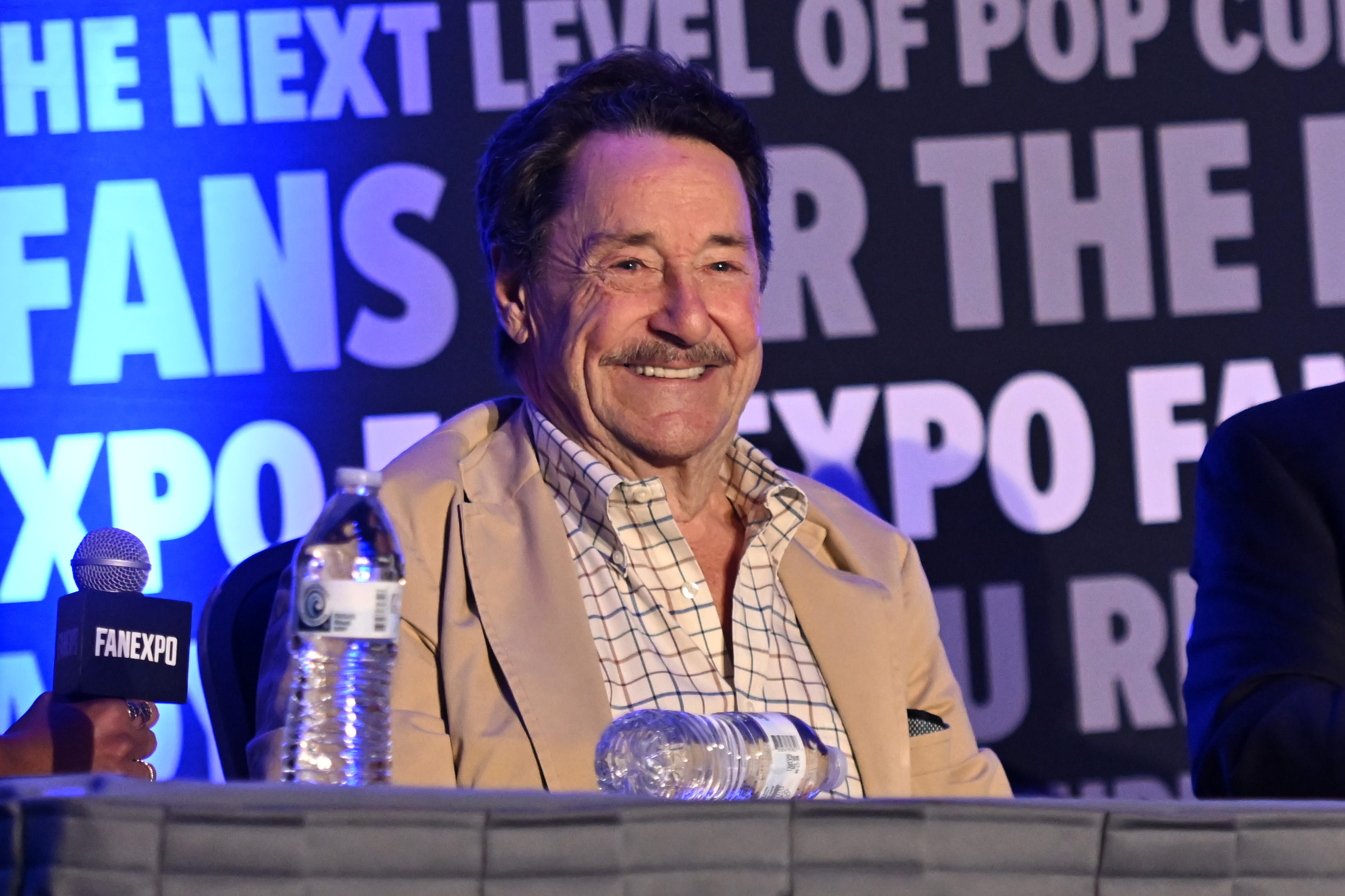 ROSEMONT, ILLINOIS - AUGUST 18: Peter Cullen speaks on stage during a panel at FAN EXPO Chicago 2024 at Donald E. Stephens Convention Center on August 18, 2024 in Rosemont, Illinois. (Photo by Daniel Boczarski/Getty Images)