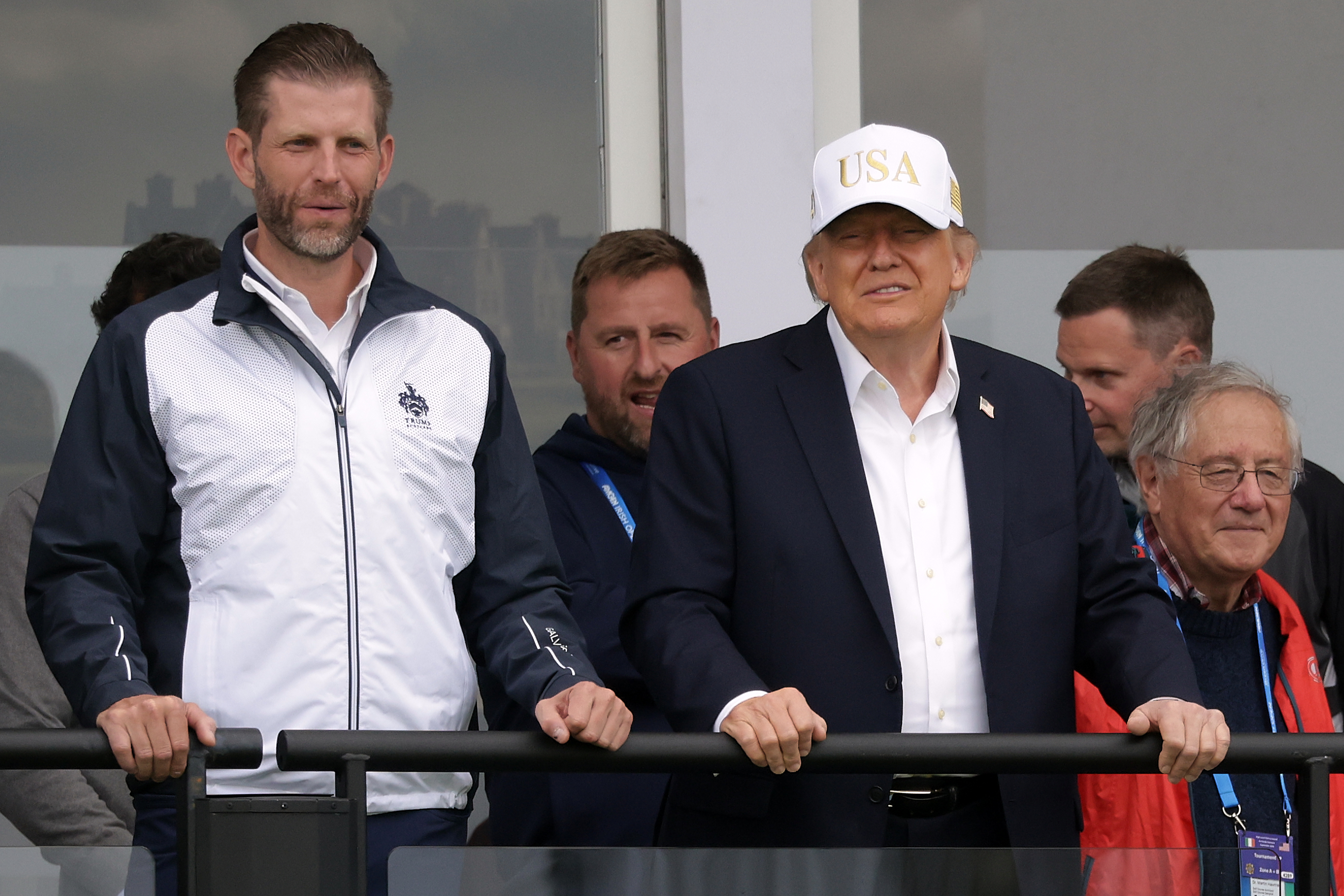 President Donald Trump and son Eric Trump watch the Irish Open at the Trump International Golf Links course in Doonbeg, Ireland, Saturday, Sept 12, 2026 (AP Photo/Peter Morrison)