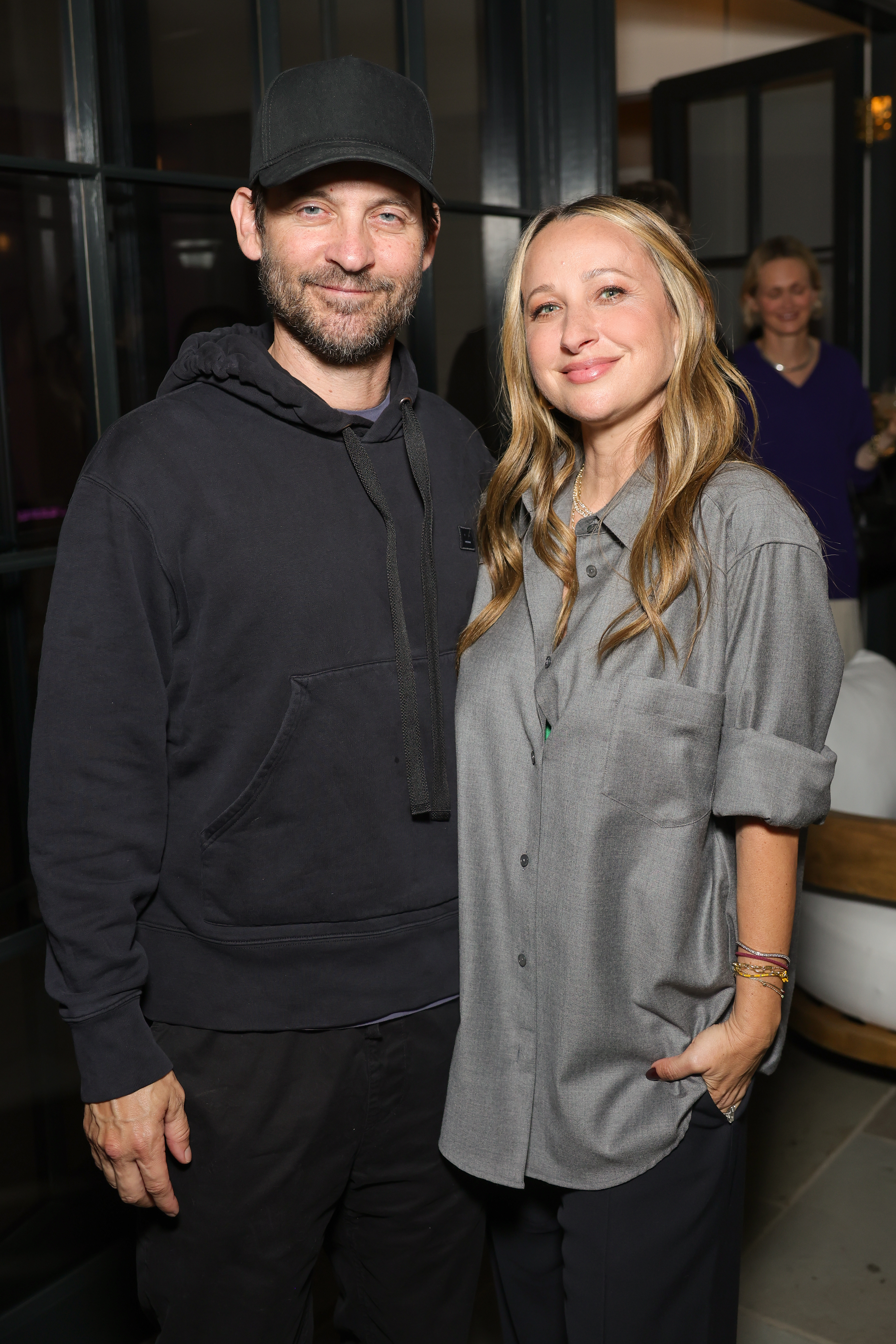 LOS ANGELES, CALIFORNIA - OCTOBER 09: (EDITOR'S NOTE: Images has been retouched.) (L-R) Tobey Maguire and Jennifer Meyer attend Jennifer Meyer's 20 Year anniversary celebration on October 09, 2025 in Los Angeles, California. (Photo by Stefanie Keenan/Getty Images for Jennifer Meyer Jewelry)