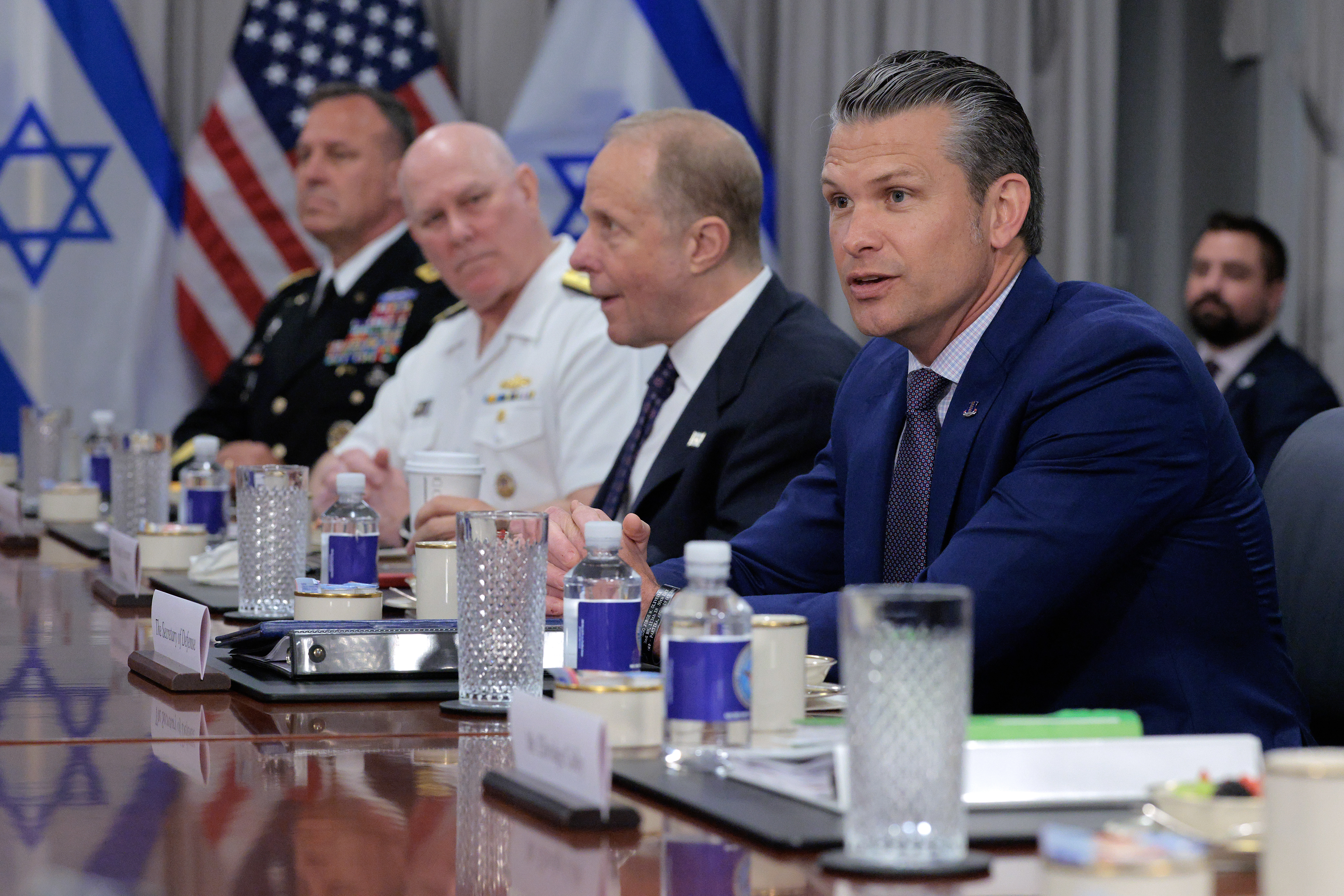 ARLINGTON, VIRGINIA - JULY 09: (R-L) U.S. Secretary of Defense Pete Hegseth, Deputy Secretary of Defense Steve Feinberg, Vice Chairman of the Joint Chiefs of Staff Admiral Christopher Grady and CENTCOM Commander Michael Kurilla attend a meeting with Israeli Prime Minister Benjamin Netanyahu at the Pentagon on July 09, 2025 in Arlington, Virginia. Netanyahu is in Washington for meetings with President Donald Trump, members of his cabinet, Congressional leaders and other officials to discuss a potential ceasefire between Israel and Hamas. (Photo by Chip Somodevilla/Getty Images)