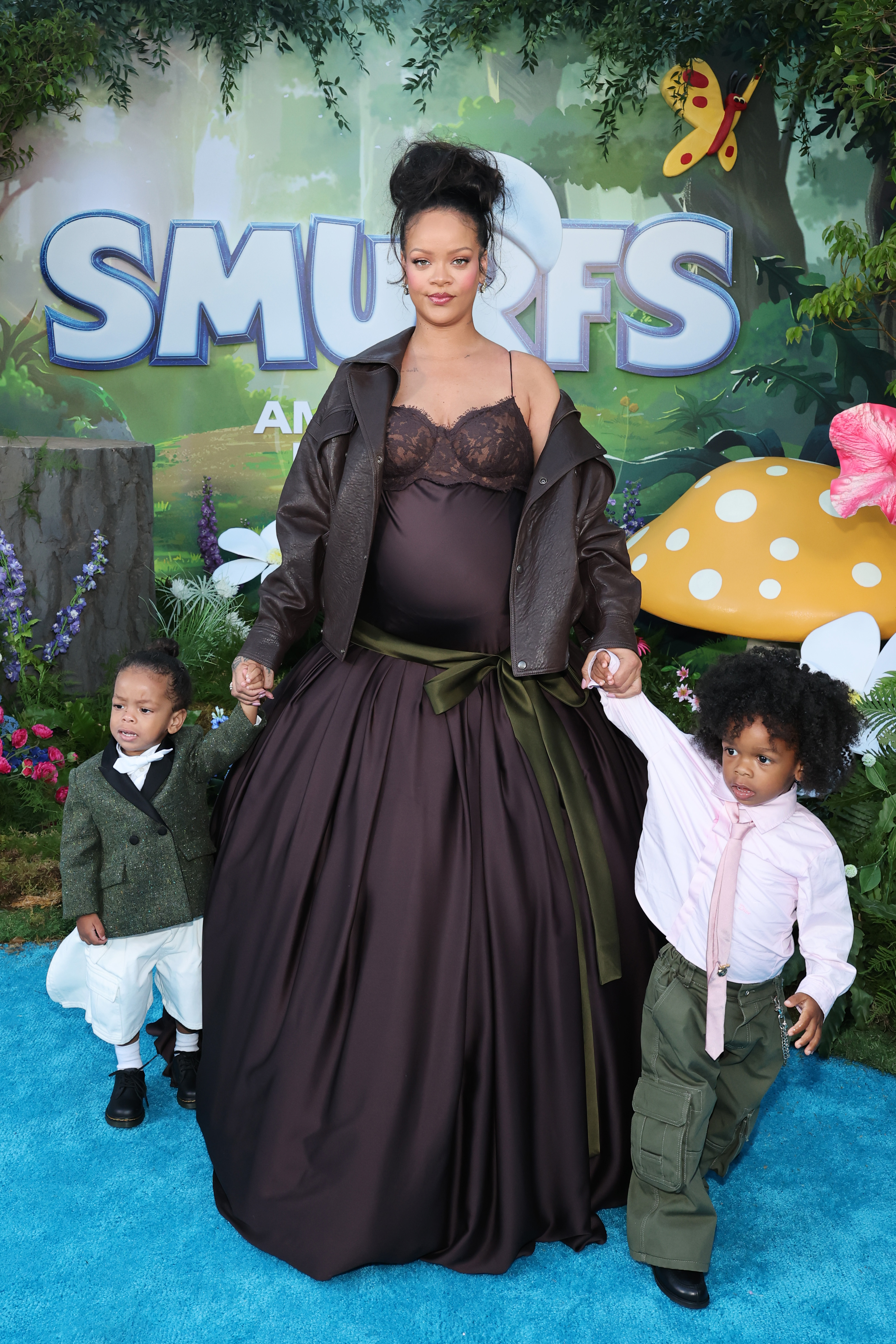 LOS ANGELES, CALIFORNIA - JULY 13: (L-R) Riot Rose Mayers, Rihanna, and RZA Athelston Mayers attend the Los Angeles Premiere of Paramount Pictures “Smurfs” at Paramount Pictures Studios on July 13, 2025 in Los Angeles, California. (Photo by Amy Sussman/Getty Images)