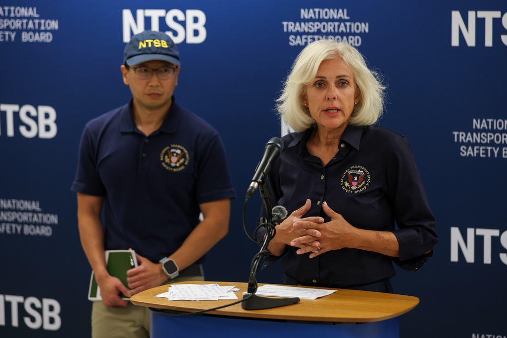 National Transportation Safety Board investigator Chihoon Shin, left, stands alongside National Transportation Safety Board Chair Jennifer Homendy as she speaks during a news conference at Miami International Airport on Monday, Sept. 7, 2026, in Miami. (AP Photo/David Santiago)