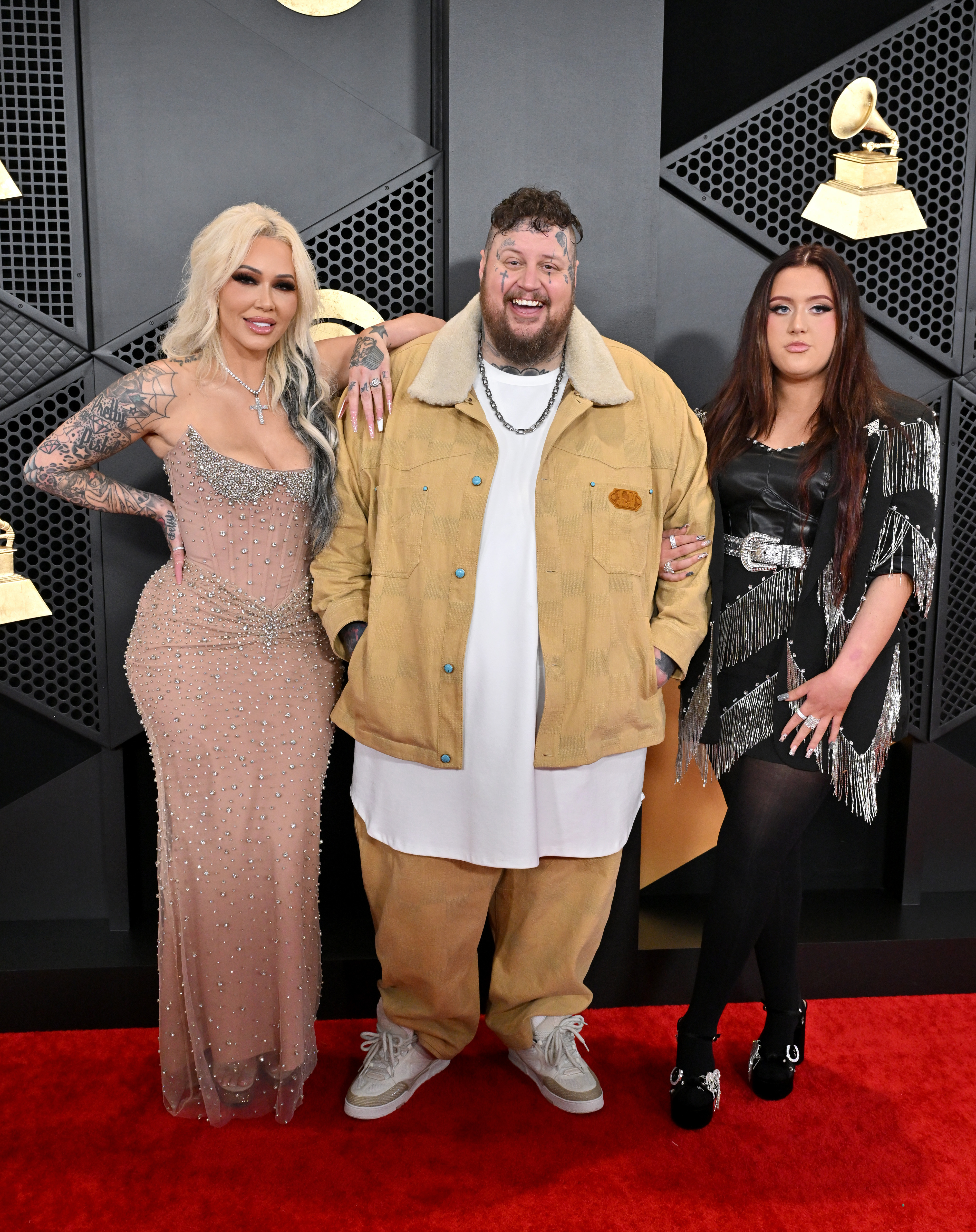 LOS ANGELES, CALIFORNIA - FEBRUARY 04: (FOR EDITORIAL USE ONLY) (L-R) Bunnie Xo, Jelly Roll, and Bailee Ann attend the 66th GRAMMY Awards at Crypto.com Arena on February 04, 2024 in Los Angeles, California. (Photo by Axelle/Bauer-Griffin/FilmMagic)