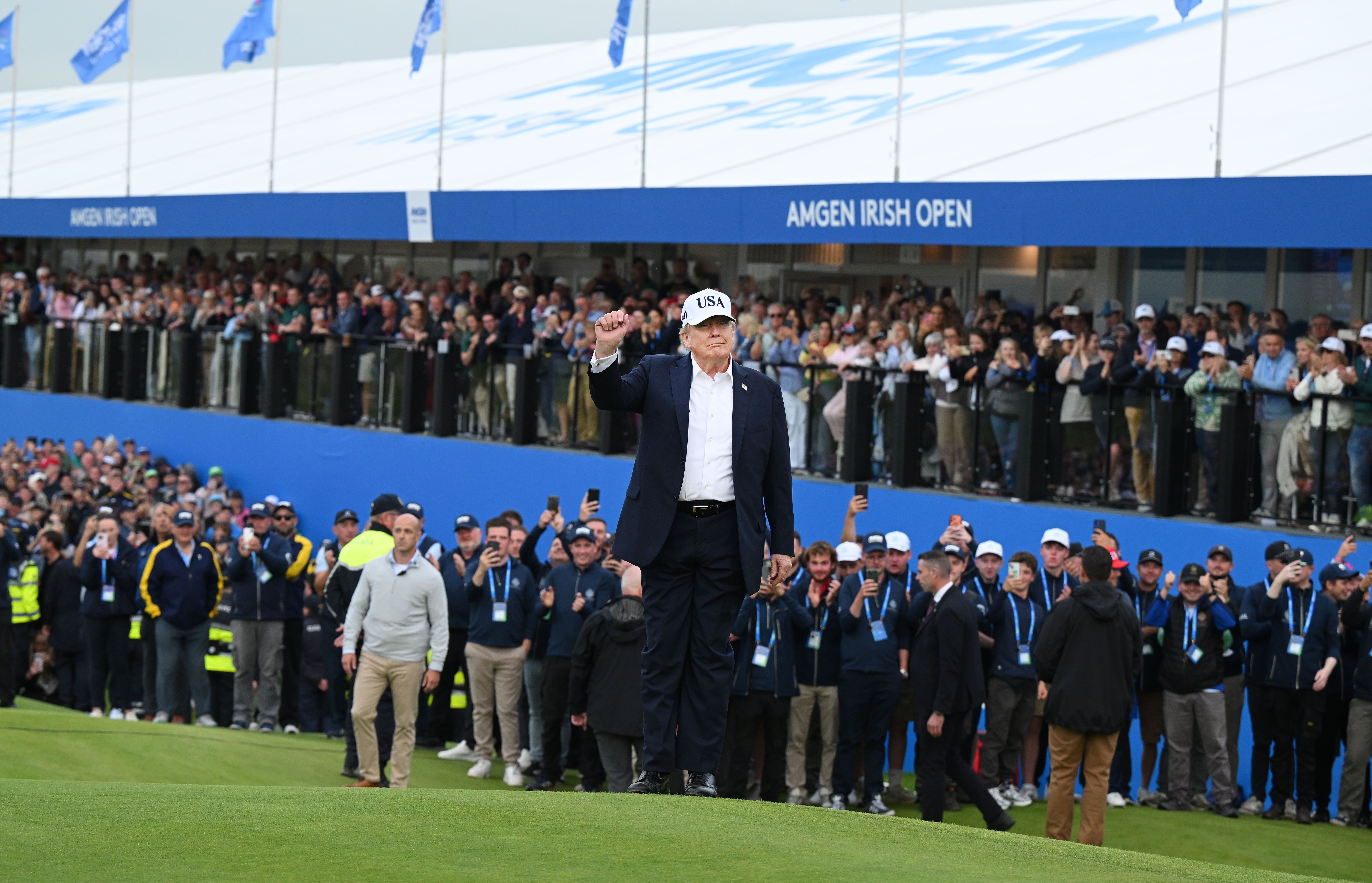 DOONBEG, IRELAND - SEPTEMBER 13: President Donald Trump is pictured on the 18th green during the prize presentation on the final day's play at the Amgen Irish Open on September 13, 2026 in Doonbeg, Ireland. U.S. President Donald Trump is making a two-day visit to Ireland this weekend. Today his trip focuses on attending the Amgen Irish Open golf tournament, which is being hosted at his Doonbeg golf resort. (Photo by Charles McQuillan/Getty Images)