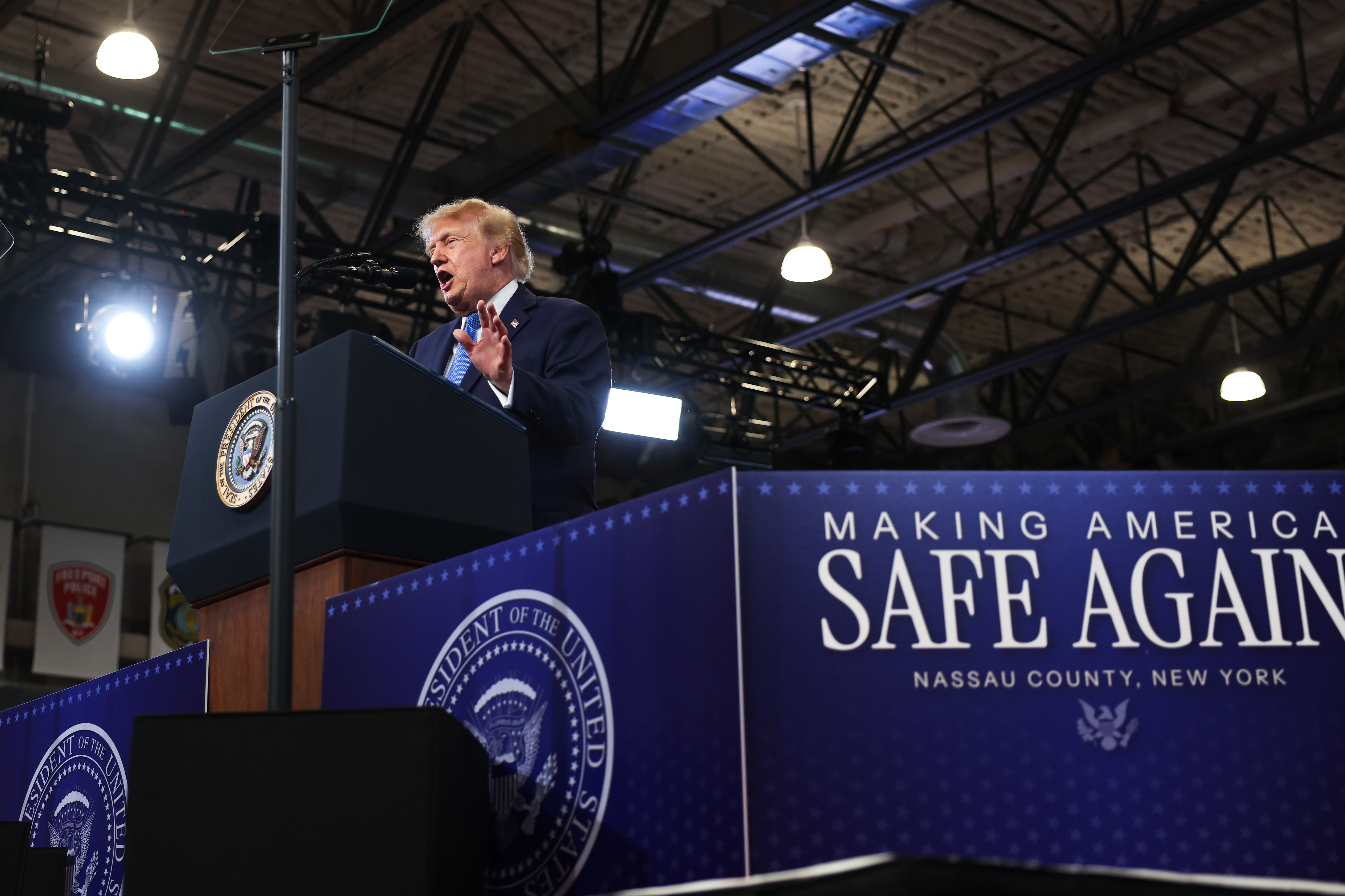 GARDEN CITY, NEW YORK - AUGUST 14: U.S. President Donald Trump delivers remarks at the David S. Mack Center for Training and Intelligence on August 14, 2026 in Garden City, New York. President Trump visited the police academy to highlight the FBI's 2025 Crime Statistics Report and rally support for local Republican candidates ahead of the upcoming midterm elections. (Photo by Samuel Corum/Getty Images)