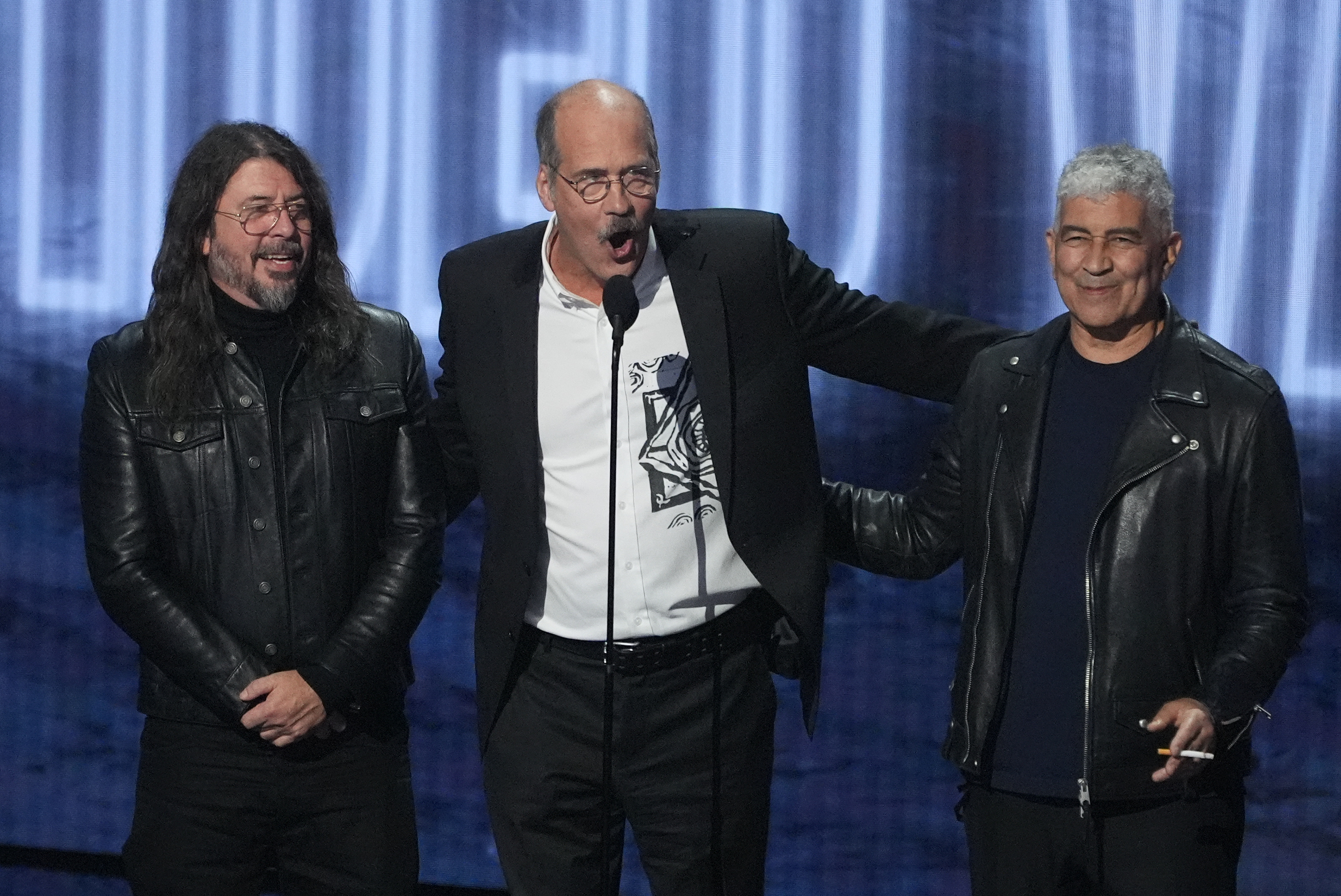David Grohl, from left, Krist Novoselic, and Pat Smear of Nirvana accept the video vanguard award during the MTV Video Music Awards on Sunday, Sept. 27, 2026, at the Peacock Theater in Los Angeles. (AP Photo/Chris Pizzello)
