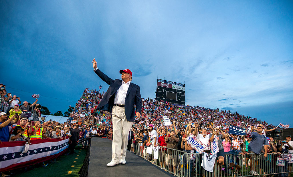 MOBILE, AL- AUGUST 21: U.S. Republican presidential candidate Donald Trump takes the stage at Ladd-Peebles Stadium on August 21, 2015 in Mobile, Alabama. The Donald Trump campaign moved tonight's rally to a larger stadium to accommodate demand. (Photo by Mark Wallheiser/Getty Images)